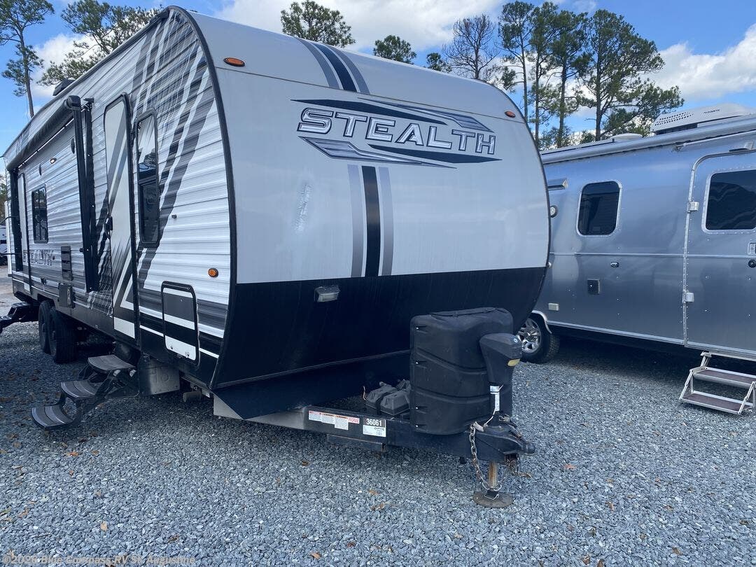 2020 Forest River Stealth FQ2916 - Used Toy Hauler For Sale by Blue Compass RV St. Augustine in St. Augustine, Florida features Slideout