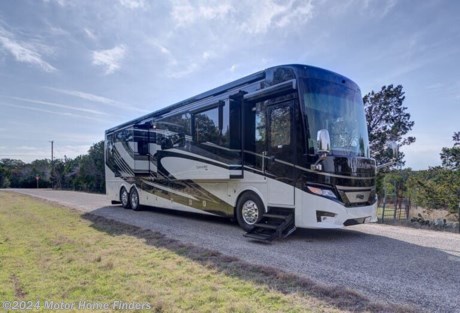 &lt;p class=&quot;MsoNormal&quot;&gt;This 2020 Newmar London Aire 4579 Triple Slide Tag Axle, All Electric, Bath and a Half Coach is powered by a 605HP Cummins Diesel, Rides on a Freightliner Chassis, has Hydraulic Leveling Jacks w/Air Leveling Control System, is mated to an Allison MH 4000 Transmission and has a hitch weight of 20,000 lbs.&lt;/p&gt;
&lt;p class=&quot;MsoNormal&quot;&gt;She comes with Belair Graphics, Ravenna Interior Decor, has Sable High Gloss Maple Cabinets, and rides on Polished Aluminum Wheels.&lt;/p&gt;
&lt;p class=&quot;MsoNormal&quot;&gt;The coach has a Keyless Entry Door with Touch Pad and Doorbell, Entrance Door with Automatic Step and Assist Handle, Designer Feature Ceiling w/Accent Lights (and Cathedral Ceiling with Added Height in Rear Bath), LED Lights in Ceiling and Underneath Overhead Cabinets, Auto Motion Power Shades and Lambrequins, Slideout Fascia Trim and Lambrequins and Heated Tile Floors.&lt;/p&gt;
&lt;p class=&quot;MsoNormal&quot;&gt;The cockpit area has a Driver Side Power Window, Villa Ultraleather Heated Front Seats with Power-Lumbar, Recline, Footrest and Queen-Sized Passenger Seat, Passenger Seat Workstation, Monitor on Passenger Side and Auto Motion Power Shades for Windshield and Driver/Passenger Side Windows.&lt;/p&gt;
&lt;p class=&quot;MsoNormal&quot;&gt;Drivers&amp;rsquo; conveniences include Convex Exterior Chrome Mirrors with Remote Control, Defrost, Turn Signals and Side-View Cameras, Electronic Chassis Information Center in Dash, Electronic Stability Control, Cruise Control, Comfort Drive&amp;trade; Steering, OnGuard Collision Mitigation Adaptive Cruise System, Antilock Brakes, Xite Dash Radio w/USB and Aux Ports, 10&quot; Dual Monitor with Rand McNally Navigation, Xite HD 360 Camera System with Predictive Grid Lines and Tri-View Rear Camera, Rearview Color Monitor System with Audio, and Prepped for 2 Rear Cameras for Stacker Trailer (also has Cord Connector Installed).&lt;/p&gt;
&lt;p class=&quot;MsoNormal&quot;&gt;Furniture is comprised of a Chaise Lounge/Euro Booth Dinette Ensemble w/2 Table Leaves, 2 Folding Chairs, a Recliner and a H-A-B Sofa w/Air Mattress.&lt;/p&gt;
&lt;p class=&quot;MsoNormal&quot;&gt;A/V components include a Samsung 43&quot; 4K LED TV in Front Overhead, a Samsung 50&quot; 4K LED TV (w/Sony Blu-Ray Player) on Televator in Living Area, a Bose 300 Sound Touch Soundbar, JBL Slimline Subwoofer, a Samsung 43&amp;rdquo; LED TV and Sony Blu-Ray Disc Player in Bedroom, Exterior Entertainment Center in Compartment with Samsung 43&quot; 4K LED TV and Soundbar, Winegard Rayzar Automatic Digital TV Antenna, Dish Trav&amp;rsquo;ler Satellite, and an Infrared Repeater System to Operate Audio/Visual Components.&lt;/p&gt;
&lt;p class=&quot;MsoNormal&quot;&gt;She also comes with the WIFI Ranger SkyPro LTE Cellular Router.&lt;/p&gt;
&lt;p class=&quot;MsoNormal&quot;&gt;The galley has a Kitchen Window, Super Polished Solid Surface Countertops (and Sink and Cooktop Covers) with Under-Mounted Stainless-Steel Sink, LED Lighting in Pull-Out Pantry and Base Cabinets, Stainless Steel Residential Refrigerator, a Convection Microwave, a Flush Mount Induction Cooktop, a Dishwasher, a Retractable Island, a Fantastic&amp;reg; Vent with Rain Sensor, Central Vacuum with Tool Kit as well as a Dyson Cordless Vacuum.&lt;/p&gt;
&lt;p class=&quot;MsoNormal&quot;&gt;&lt;span style=&quot;mso-fareast-font-family: &#39;Times New Roman&#39;;&quot;&gt;The 1/2 bath has Super Polished Solid Surface Countertops, an Undermount Sink Vanity, a Fantastic* Vent with Rain Sensor, RV Sanicom System and China Bowl Toilet&lt;/span&gt;.&lt;/p&gt;
&lt;p class=&quot;MsoNormal&quot;&gt;Past the &amp;frac12; bath is the bedroom with a Sleep # King Bed w/Air Mattress, TV and Blu-Ray, Secondary Multiple Touch Screen, Chest of Drawers and 2 Nightstands with Overhead Storage.&lt;/p&gt;
&lt;p class=&quot;MsoNormal&quot;&gt;The bathroom has Super Polished Solid Surface Countertops, a Dual Undermount Sink Vanity, Solid Surface Shower Walls with Glass Door w/a Fold-Down Shower Seat and Assist Handle, a Skylight, a Fantastic&amp;reg; Vent with Rain Sensor, RV Sanicom System, a China Bowl Toilet, a Linen Closet, and a Walk-In Closet that houses the Safe, the Lit Cedar Paneled Wardrobe and the Washer/Dryer.&lt;/p&gt;
&lt;p class=&quot;MsoNormal&quot;&gt;There is also an Egress Door with a Ladder.&lt;/p&gt;
&lt;p class=&quot;MsoNormal&quot;&gt;The electrical systems begin with a 50 Amp Electrical Service with 50-foot Flexible Power Rewind Wheel Cord, Silverleaf&amp;reg; Multiplex Electrical Wiring System, a 12.5 kW Generator with Transfer Switch/Surge Protector and Automatic Generator Start on Low Battery or Temperature Setting, a 3000-Watt True Sine Inverter and (8) AGM Batteries.&lt;/p&gt;
&lt;p class=&quot;MsoNormal&quot;&gt;Heating and cooling are controlled by Wall-Mounted Sensors/Thermostats for the (3) 15M Penguin&amp;trade; Heat Pump Central Air Conditioners and a Hydronic Zone Heat System with Continuous Hot Water.&lt;/p&gt;
&lt;p class=&quot;MsoNormal&quot;&gt;Exterior features include the Girard Awning Package with two Nova Side Awnings, Slideout Covers and Entrance Door and Power Window Awnings, Power Pass-Through Storage Tray w/Shelf, Automatic Mechanical Lock Arms on Non-Hydraulic Slideout Rooms, Hot Water Line and Air Connection to Generator Area, Dometic 3.77 Cf Freezer on Pull-Out Tray, Rear Protective Tow Guard with Stainless Steel Newmar Name Cutout, Stainless Steel Exterior Trim Pieces and Entrance Door Kick Panel, Frameless Double-Pane Tinted Safety Glass Windows, LED Lights in Exterior Storage Compartments, Recessed Docking Lights, and a Power Water Hose Reel.&lt;/p&gt;
&lt;p class=&quot;MsoNormal&quot;&gt;In addition to the Dish Trav&amp;rsquo;ler Satellite, the owner also added an Air Brake Connector for the Air Force One Braking System, a Dyson Rechargeable Vacuum and Custom Magna Shades for the Windshield, Mirrors, Driver and Passenger Windows.&lt;span style=&quot;mso-spacerun: yes;&quot;&gt;&amp;nbsp; &lt;/span&gt;She is Immaculate, Never Had Any Pets or Smokers and just had her Annual Service.&lt;/p&gt;