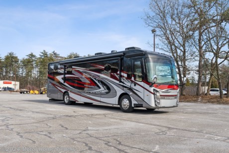 &lt;p class=&quot;MsoNormal&quot;&gt;This 2023 &quot;Turn Key Ready&quot; Reatta XL 39 BH Triple Slide, Bath and a Half, All Electric Coach is powered by a Cummins&amp;reg; L9 turbocharged 380 HP engine, rides on a Spartan&amp;reg; K2 raised-rail chassis w/ Independent front air suspension, has Equalizer&amp;trade; hydraulic automatic coach leveling and is mated to an Allison&amp;reg; 3,000 MH 6-speed transmission.&lt;span style=&quot;mso-spacerun: yes;&quot;&gt;&amp;nbsp; &lt;/span&gt;She has a 10,000 lb. hitch Weight.&lt;/p&gt;
&lt;p class=&quot;MsoNormal&quot;&gt;She comes in Rio Red FBP, with the Glacier Interior and Auburn Cabinetry.&lt;/p&gt;
&lt;p class=&quot;MsoNormal&quot;&gt;The Entry Way has a Grab Handle and Keypad System for Keyless Entry, a Removable Screen on Entry Door and a Powered Flush Stepwell Cover.&lt;/p&gt;
&lt;p class=&quot;MsoNormal&quot;&gt;The Cockpit has 6-Way Power Adjustable Driver and Passenger Seats with Power Recline, Powered Front Sun Visors and Privacy Shades, Steering Wheel With Integrated Controls For Cruise, Wipers, Radio And Bluetooth&amp;reg; Phone Functionality, Manual Tilt/Telescoping Steering Column, Heated, Remote-Control, Side-View Mirrors With Integrated Cameras, Digital Dash With Quad Core Graphics Processor for On-Board Diagnostics, Xite&amp;trade; 360&amp;deg; HD Digital Camera System, Xite&amp;trade; XSG4 Infotainment System w/ Whole-Coach Audio Distribution, Wireless Tire Pressure Monitoring System (TPMS) With Temperature Monitoring and a 32 In. Samsung&amp;reg; LED 1080P Smart TV In Front Overhead.&lt;/p&gt;
&lt;p class=&quot;MsoNormal&quot;&gt;The Interior has a Decorative Ceiling Feature with Integrated Accent Lighting, LED Interior Lighting, Hand-Laid, Woodgrain Porcelain Heated Tiled Floors and Manual Solar Day/Blackout Night Shades.&lt;/p&gt;
&lt;p class=&quot;MsoNormal&quot;&gt;Furniture Is Comprised Of (2) Powered Bunks, Theater Seating with Power Recliners and A Dinette.&lt;/p&gt;
&lt;p class=&quot;MsoNormal&quot;&gt;The A/V system includes a Firefly multiplex system with 10 in. VegaTouch touchscreen for complete integration of coach controls, a 50 in. Samsung&amp;reg; 4K UHD Smart TV w/Samsung&amp;reg; sound bar with subwoofer and Sony&amp;reg; Blu-ray&amp;trade; player, a 32 in. Samsung&amp;reg; LED 1080P Smart TV w/Sony&amp;reg; Blu-ray&amp;trade; player, a Winegard&amp;reg; in-motion satellite dome, a Winegard&amp;reg; TRAV&amp;rsquo;LER satellite dish DIRECTV&amp;reg;, a Winegard Connect 2.0 Wi-Fi/4G antenna.&lt;/p&gt;
&lt;p class=&quot;MsoNormal&quot;&gt;The Galley has Solid-Surface Countertops with a Stainless-Steel Sink, a Stainless Steel Residential Refrigerator with Ice Maker and Water Dispenser, an Induction Cooktop, a Convection Microwave Oven and Central Vacuum.&lt;/p&gt;
&lt;p class=&quot;MsoNormal&quot;&gt;Opposite the 2 Powered Bunks is the &amp;frac12; bath.&lt;/p&gt;
&lt;p class=&quot;MsoNormal&quot;&gt;The Bedroom has a King-size pillow-top mattress (on tilt bed), a Wardrobe and Dresser, the 32&amp;rdquo; Lift TV, Nightstands and Overhead Cabinetry.&lt;/p&gt;
&lt;p class=&quot;MsoNormal&quot;&gt;The Main Bathroom has Solid-Surface Countertops with Integrated Sink, a Medicine Cabinet, a One-Piece Fiberglass Shower with Skylight and Aqua View SHOWERMI$ER&amp;trade; Water Saving System, a Thetford&amp;reg; Aqua Magic Toilet with Foot Flush, A Fan-Tastic Power Exhaust Fan with Intake, a Linen Closet and The Separate Washer and Dryer.&lt;/p&gt;
&lt;p class=&quot;MsoNormal&quot;&gt;Heating, Cooling and Hot Water and Provided by (3) 15,000 BTU A/C Units with Heat Pumps and an Aqua-Hot&amp;reg; 250D Hydronic Water and Heating System.&lt;/p&gt;
&lt;p class=&quot;MsoNormal&quot;&gt;Power Comes from A 50 Amp Power Cord on an Electric Powered Reel W/Automatic Transfer Switch with Surge Protection, An Onan&amp;reg; 10,000W Diesel Generator with Automatic Start on Slide-Out Tray, A 2,000W Pure Sine Wave Inverter With 100 Amp Battery Charger, (2) 12V Chassis Batteries, (2) L16 AGM Batteries and (2) 190W Solar Panels.&lt;/p&gt;
&lt;p class=&quot;MsoNormal&quot;&gt;Exterior Features Include a Porch Light, Carefree&amp;reg; Power Patio and Entrance Awnings with LED Lights, Carefree&amp;reg; Slideout and Window Awnings, a 43 In. Samsung&amp;reg; 4K UHD Smart TV With Tilt/ Swivel/Extend Adjustment w/JBL&amp;reg; Radio and Speakers, Exterior Utility Center, Slideout Basement Storage Tray, Heated Basement Storage, Sani-Con&amp;reg; Macerator Holding Tank Dump System,&lt;span style=&quot;mso-spacerun: yes;&quot;&gt;&amp;nbsp;&lt;/span&gt;Frameless, Dual-Pane, Tinted, Safety-Glass Windows and a Mudflap with Chrome &amp;ldquo;Entegra&amp;rdquo; Nameplate.&lt;/p&gt;
&lt;p class=&quot;MsoNormal&quot;&gt;Come and See Her and Drive Her Home.&lt;/p&gt;