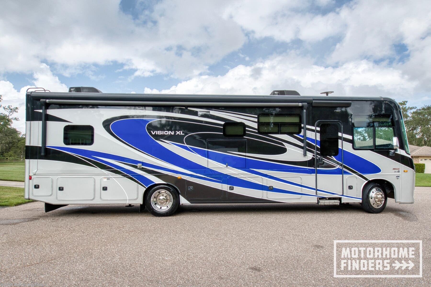 2021 Entegra Coach Vision XL 34G - Used Class A For Sale by Motorhome Finders in Debary, Florida features Refrigerator, Batteries, Black Tank Flush, Outside Entertainment Center, Ladder