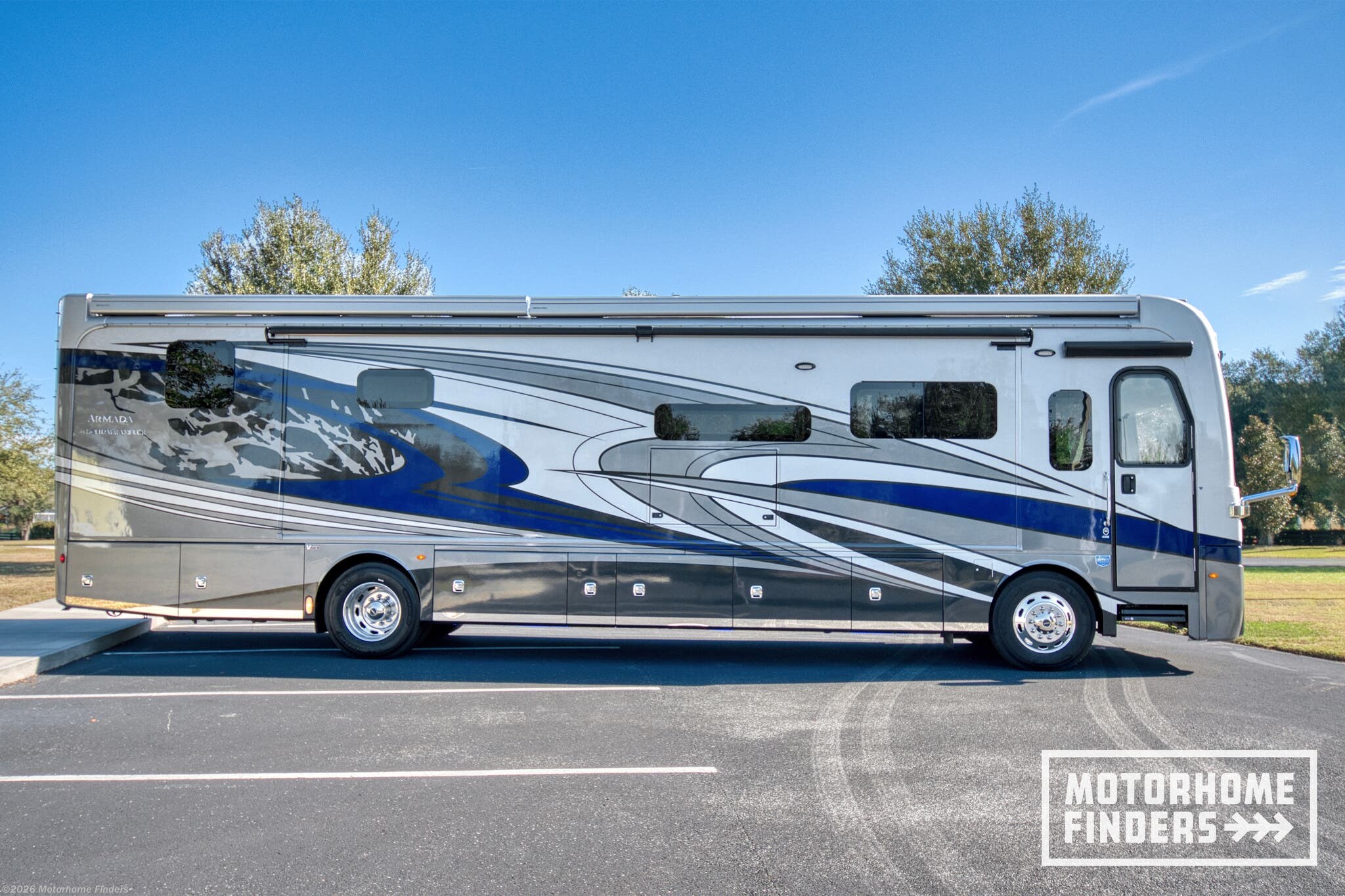 2022 Holiday Rambler Armada 40M - Used Diesel Pusher For Sale by Motorhome Finders in Summerfield, Florida features Power Roof Vent, Bath & 1/2, Outside Entertainment Center, Air Conditioning, Pass Thru Storage