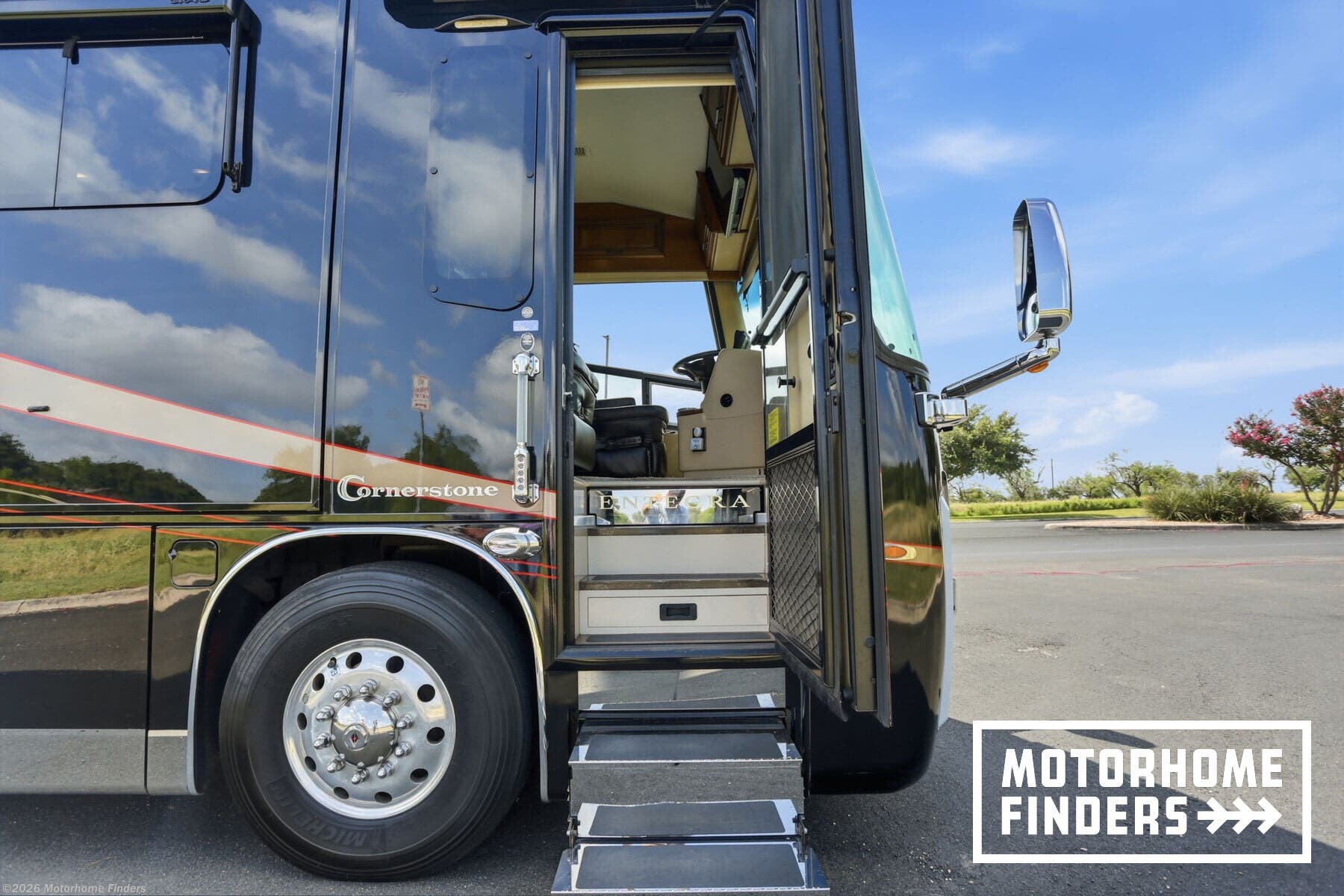 2017 Entegra Coach Cornerstone 45W - Used Diesel Pusher For Sale by Motorhome Finders in San Antonio, Texas features Free Standing Dinette w/Chairs, Security System, Batteries, Refrigerator, Televator TV