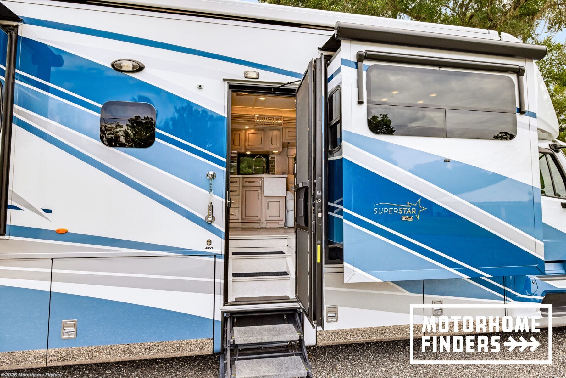 2023 Newmar Super Star 4059 - Used Super C For Sale by Motorhome Finders in Deland, Florida features Booth Dinette, Hydronic Heat, Smoke Detector, Queen Bed, Backup Camera