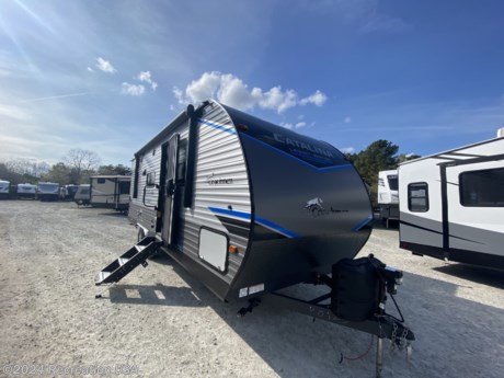 &lt;p&gt;2022 Coachmen Catalina Legacy Edition 243RBS&lt;/p&gt;
&lt;p&gt;JAVA DECOR&lt;/p&gt;
&lt;p&gt;LEGACY EDITION PACKAGE SKYLIGHT ABOVE TUB/SHOWER, BEDROOM USB AND OUTLETS, GAS/ ELECTRIC DSI WATER HEATER, 12V ROOF VENT AND FAN IN LIVING AND BATHROOM, 5/8&quot; TONGUE AND GROOVE PLYWOOD FLOORING, ALL-IN-ONE MONITOR SYSTEM, JIFFY SOFA W/ FLIP DOWN CUPHOLDER (RETAIL VALUE $1,290.00)&lt;/p&gt;
&lt;p&gt;PREMIER MEDIA ACCESS PACKAGE 39&quot; ENTERTAINMENT TV (32&quot; ON 26TH, 263RLS), SWING ARM TV BRACKET, COMPACT HEAD UNIT W/ BLUETOOTH/AUX/HDMI/AM/FM RADIO AND USB CHARGING PORT, JBL ELITE EXTERIOR SPEAKERS (RETAIL VALUE $505.00)&lt;/p&gt;
&lt;p&gt;DESIGNER KITCHEN PACKAGE 12V 10 CU FT REFER, RESIDENTIAL PULL DOWN FAUCET, THERMOFOIL COUNTERTOPS W/ SMOOTH DROP EDGE, DEEP BASIN FARM STYLE SINK, SINK COVERS, STAINLESS RANGE OVEN W/ BLUE LED ACCENT LIGHTING AND FLUSH MOUNTED GLASS TOP, (2) USB AND (2) 110 OUTLETS (RETAIL VALUE $1,690.00)&lt;/p&gt;
&lt;p&gt;AMBIENCE PACKAGE - POWER AWNING W/ MULTICOLOR CUSTOMIZABLE LED STRIP AND REMOTE (RETAIL VALUE $499.00)&lt;/p&gt;
&lt;p&gt;PREMIUM EXTERIOR PACKAGE ENCLOSED UNDERBELLY, 200LB FLIP-DOWN CARGO CARRYING RACK, POWER TONGUE JACK, BLACK TANK FLUSH, LP QUICK CONNECT, HOT/ COLD OUTSIDE SHOWER, ALUMINUM FENDER SKIRTS, UPGRADED ALUMINUM RIMS, FRICTION HINGE DOOR, BATTERY DISCONNECT, EXTERIOR TV HOOKUPS, BACK-UP CAMERA PREP (RETAIL VALUE $1,115.00)&lt;/p&gt;
&lt;p&gt;15K BTU DUCTED A/C IPO 13.5K BTU A/C&lt;/p&gt;
&lt;p&gt;SOLIDSTEP ENTRANCE STEPS IPO FLIP-DOWN STEPS&lt;/p&gt;
&lt;p&gt;OFF-GRID SOLAR PACKAGE - 40 AMP SOLAR CONTROLLER AND 100 WATT INSTALLED SOLAR PANEL&lt;/p&gt;
&lt;p&gt;BAR STOOLS&lt;/p&gt;
&lt;p&gt;30&quot; BUILT IN FIREPLACE&amp;nbsp;&lt;/p&gt;
&lt;p&gt;&lt;span style=&quot;text-decoration: underline; font-size: 24px;&quot;&gt;&lt;strong&gt;****PRICE INCLUDES ALL FREIGHT AND PREP****&lt;/strong&gt;&lt;/span&gt;&lt;/p&gt;