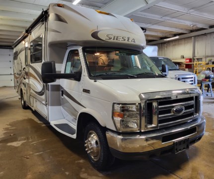 Vehicle Type:	Motorhomes
Fuel Type:	Gasoline
Manufacturer:	Thor Motor Coach
Year:	2014
Series:	Four Winds Siesta Series
Model:	M-29TB E450-V10
Length:	31 1/2&#39;
Coach Design:	Mini Motor Home (Class C)
Floor Plan:	Queen Bed
Self-Contained:	Yes
Slides:	3
Suggested List Price:	$111,023