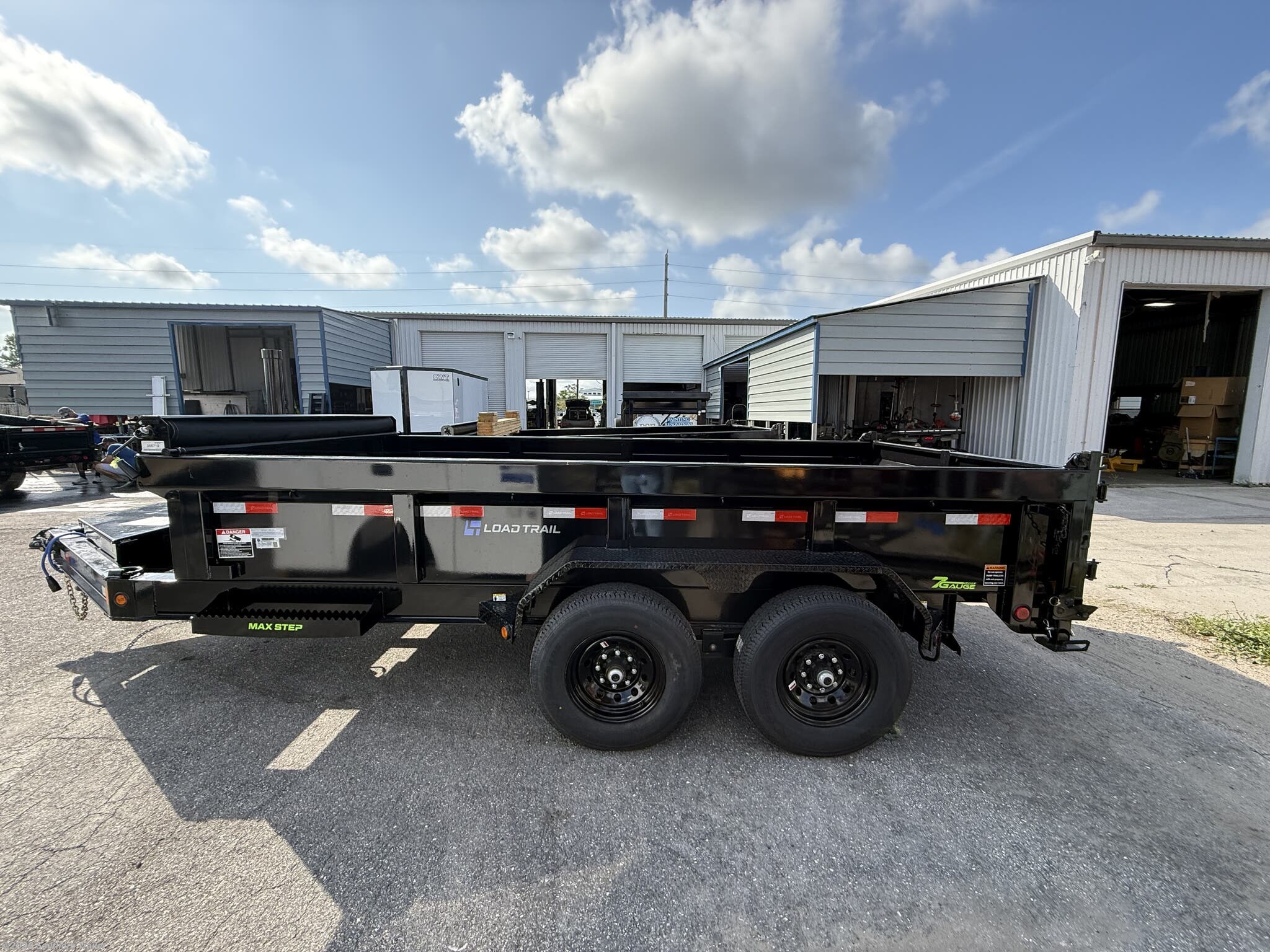 New 2025 Load Trail DL 83X14X2 Telescopic Dump w/Hyd. Jack &amp; Tarp 14K GVW available in Englewood, Florida