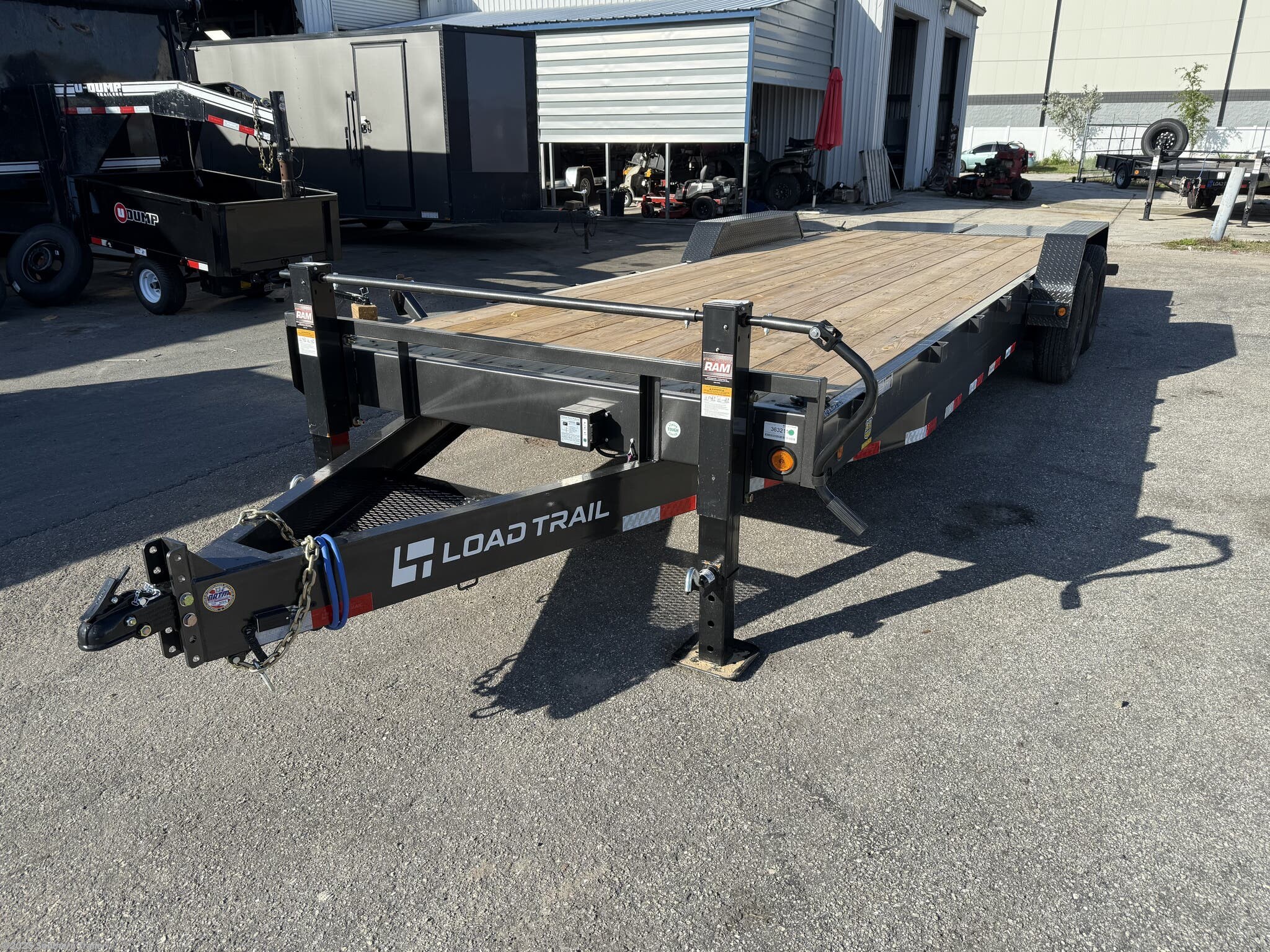 New 2026 Load Trail CH 83X24 Equipment Trailer w/MAX Ramps 14K GVWR available in Englewood, Florida