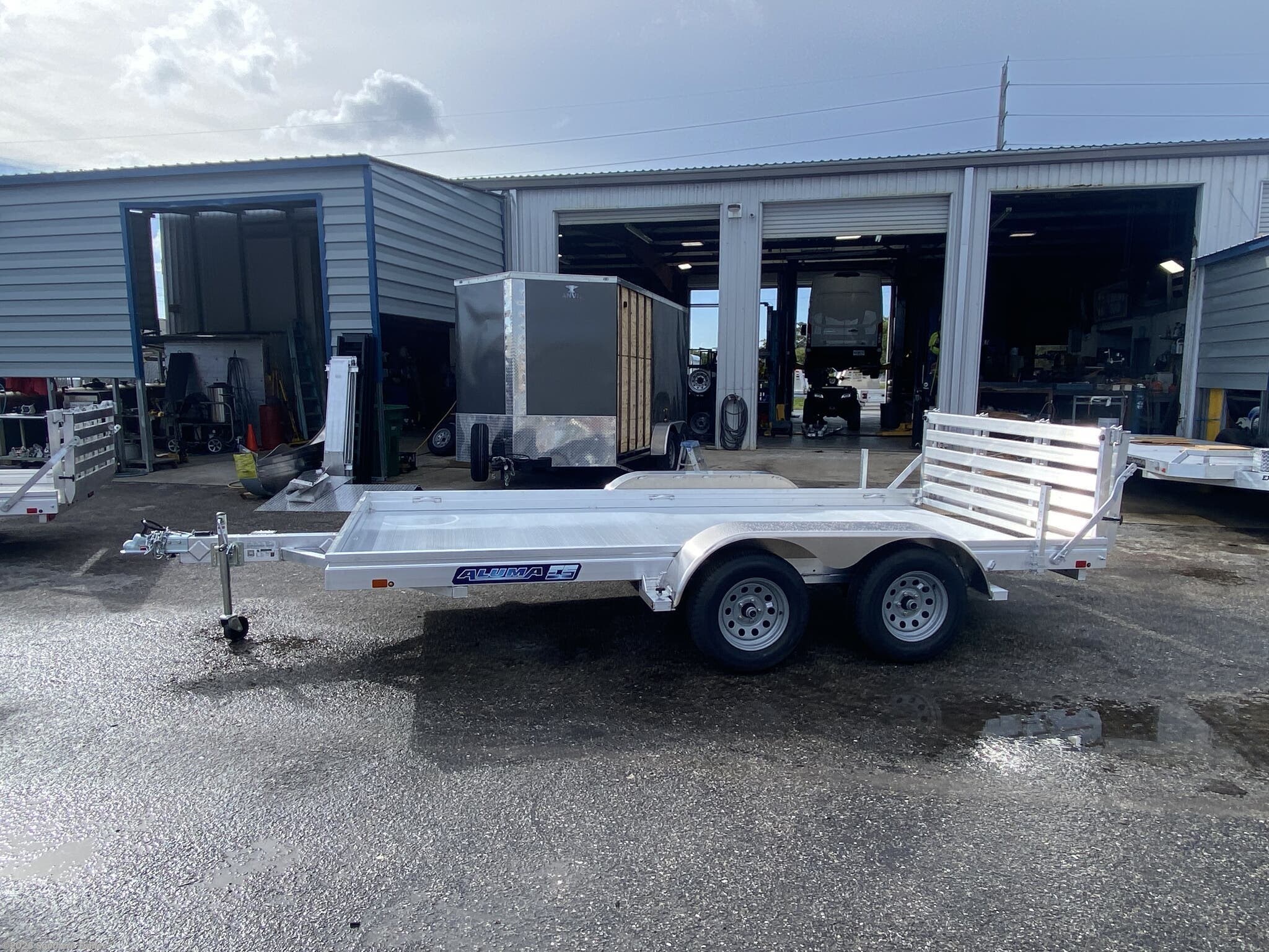 New 2026 Aluma 7814ESA-TA 14&apos; Aluminum Utility Trailer w/ Bi-Fold Gate 7K GV available in Englewood, Florida