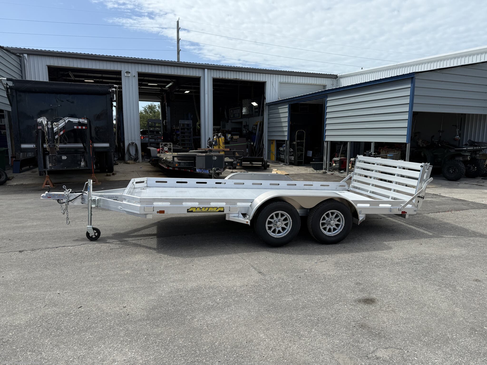 New 2027 Aluma 7814TA-EL-BT-RTD 14' Aluminum Utility Trailer Bi-Fold Gate 7K GVWR available in Englewood, Florida