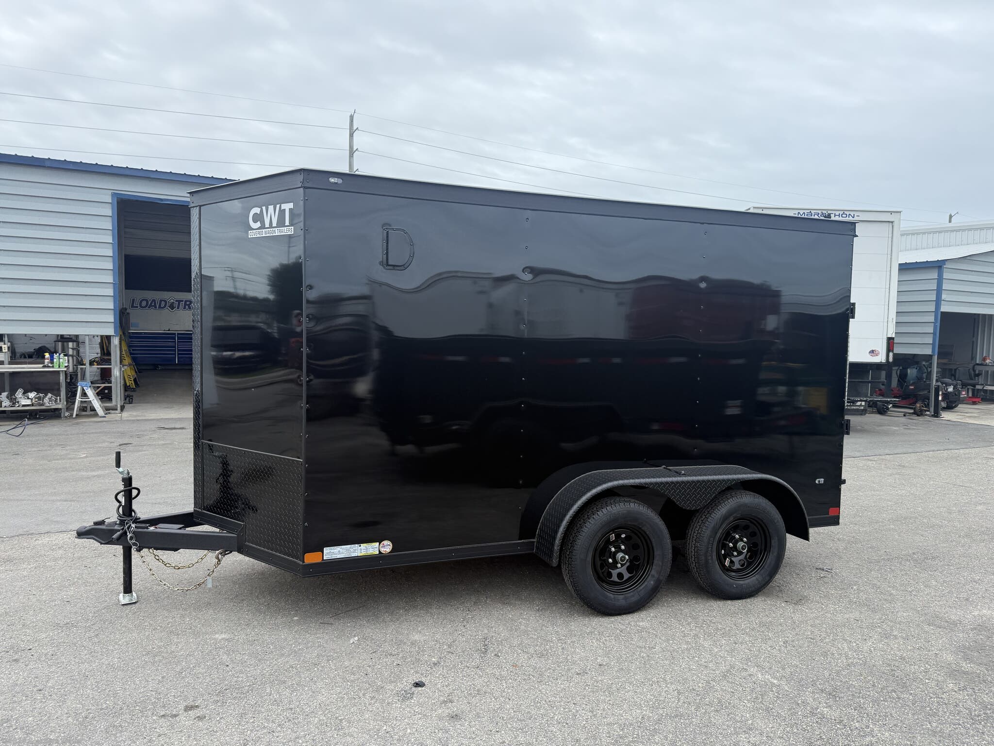 New 2026 Covered Wagon 6X12 Tandem Axle Enclosed Trailer 7K GVWR available in Englewood, Florida