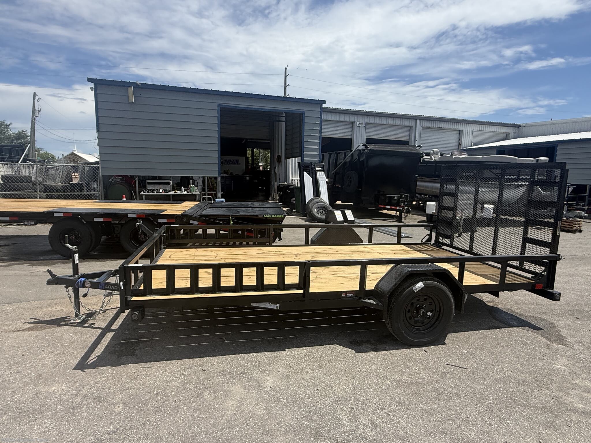 2026 SE 83X14 Utility Trailer w/Side Rail Ramps 2990 GVWR by Load Trail from Southern Trailer in Englewood, Florida