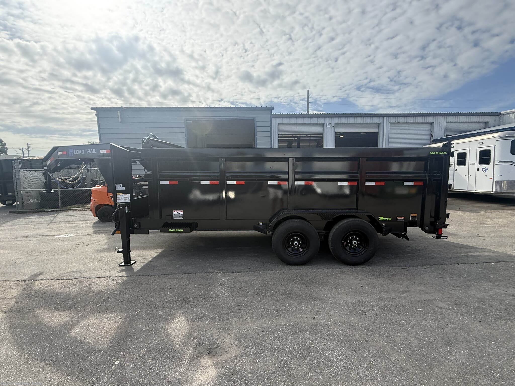 New 2027 Load Trail DG 83X16X4 Gooseneck Low Pro Dump Trailer 14K GVWR available in Englewood, Florida