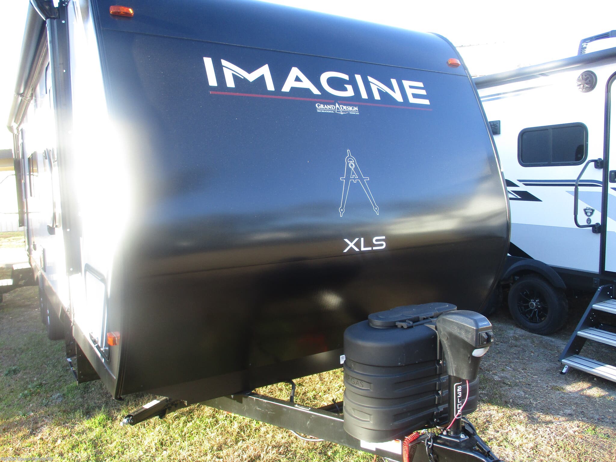 2025 Grand Design Imagine XLS 23LDE - New Travel Trailer For Sale by Couch Family RV in Cross City, Florida features Auxiliary Battery, Microwave, LP Detector, Solar Panels, Air Conditioning