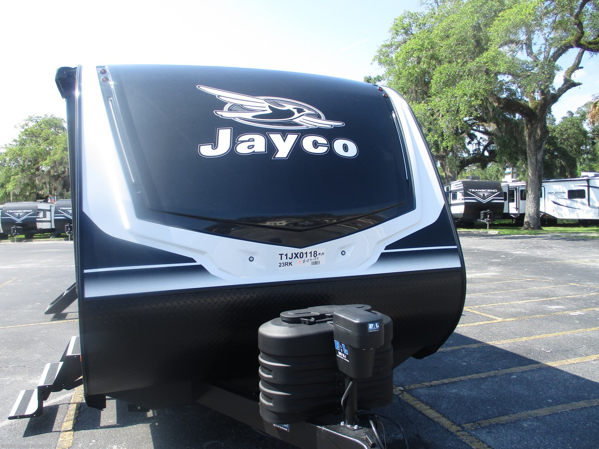 2026 Jayco Jay Feather 23RK - New Travel Trailer For Sale by Couch Family RV in Cross City, Florida features Leveling Jacks, Medicine Cabinet, Booth Dinette, Auxiliary Battery, Fireplace