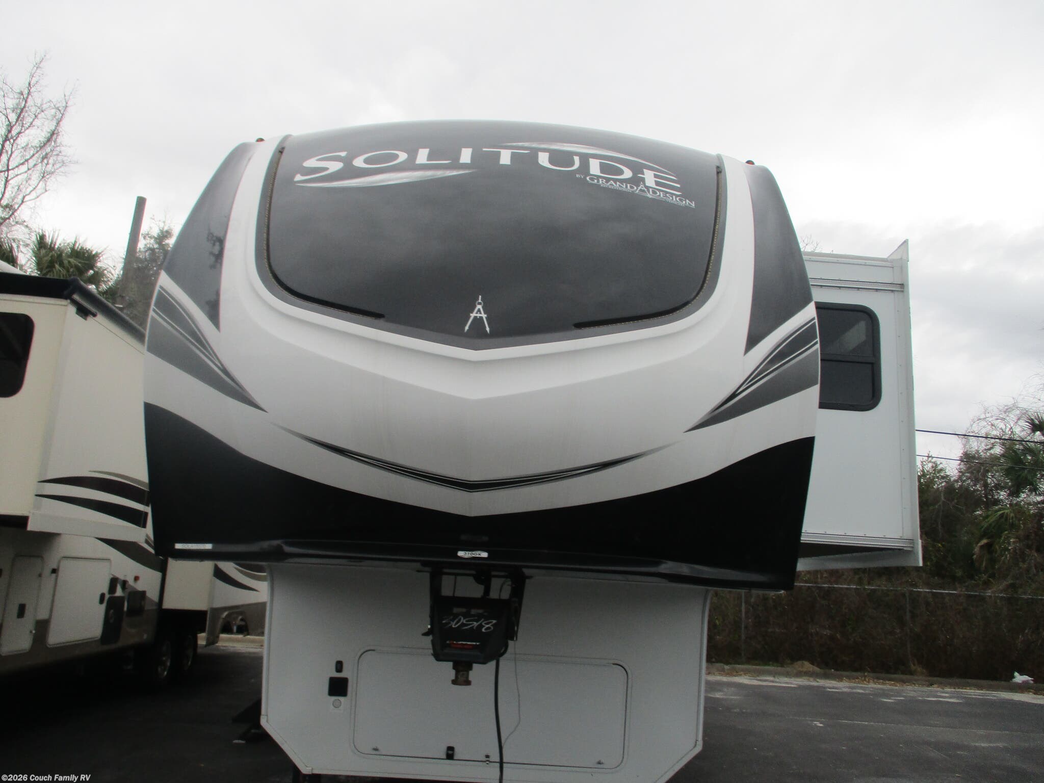 2022 Grand Design Solitude 310GK - Used Fifth Wheel For Sale by Couch Family RV in Cross City, Florida features Stove, Washer/Dryer Prep, Solid Surface Countertops, Converter, Furnace