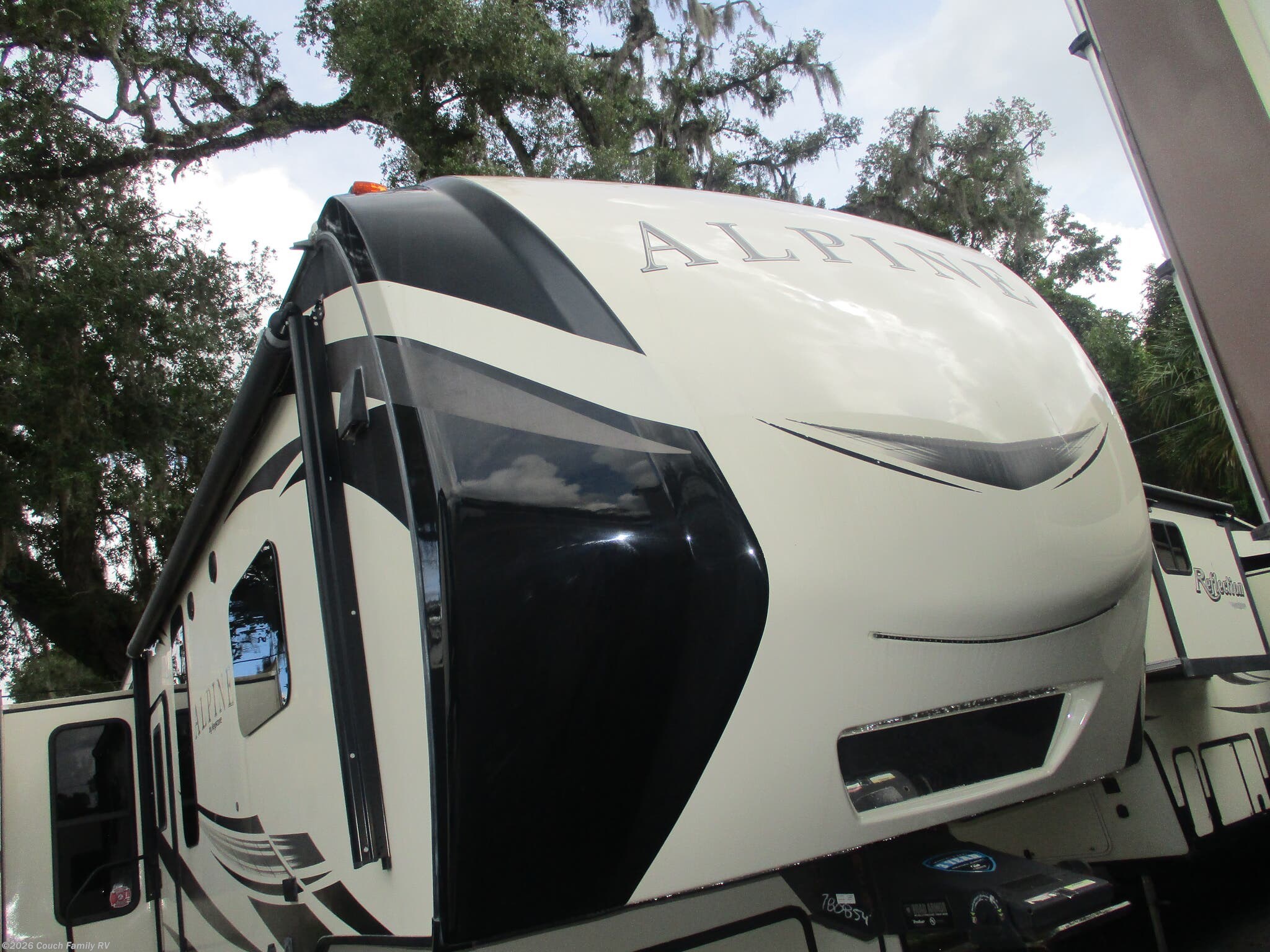 2019 Keystone Alpine 3400RS - Used Fifth Wheel For Sale by Couch Family RV in Cross City, Florida features TV, Awning, Hitch, Roof Vent, Solar Prep