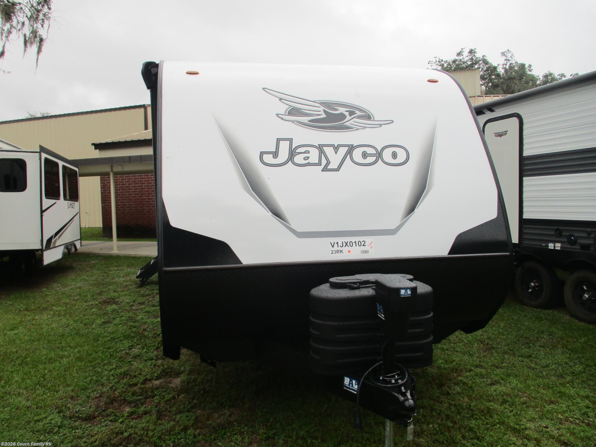 2027 Jayco Jay Feather 23RK - New Travel Trailer For Sale by Couch Family RV in Cross City, Florida features Ladder, Smart TV, Kitchen Sink, Refrigerator, Furnace