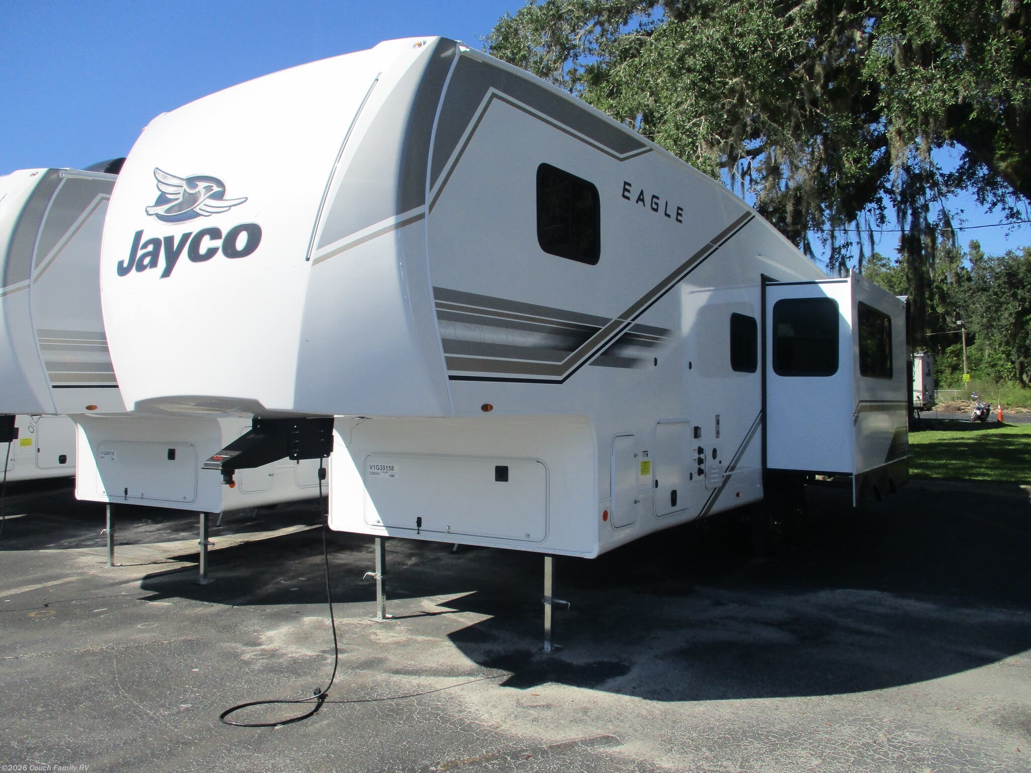 2027 Jayco Eagle SLE 28BHU - New Fifth Wheel For Sale by Couch Family RV in Cross City, Florida features Awning, Furnace, Smart TV, TV, Toilet