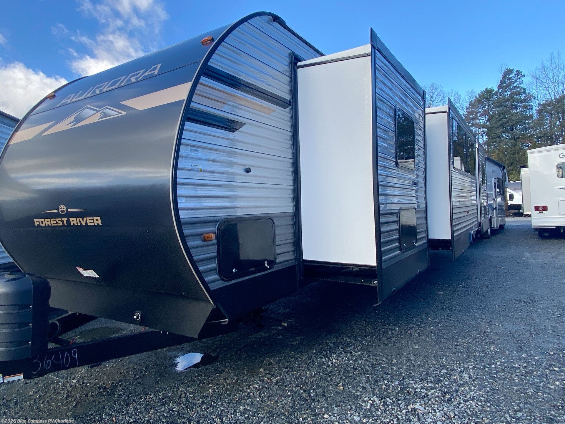 2026 Aurora 34BHTS (2 Queen Beds) by Forest River from Blue Compass RV Charlotte in Concord, North Carolina