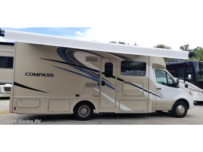 2020 Thor Motor Coach Compass 24SX - Used Class C For Sale by Glades RV in Fort Myers, Florida features Slide-out Awning, Power Roof Vent, Rocker Recliner(s), Backup Monitor, GPS Navigation