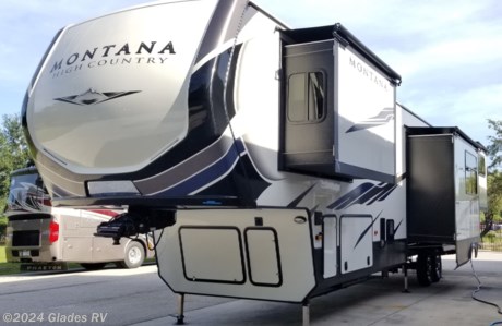 &lt;p&gt;THIS BEAUTIFUL 5TH WHEEL FEATURES 4 SLIDE OUTS WITH TOPPERS, AUTO LEVELING, LOTS OF EXTERIOR STORAGE, RESIDENTIAL REFRIGERATOR, LARGE PANTRY, REAR DEN, LARGE FLAT SCREEN TV, FIRE PLACE, MOLDED SHOWER WITH GLASS DOOR, TWO LAVATORY SINKS, KING BED, WASHER/DRYER READY AND MUCH MORE!&lt;/p&gt;