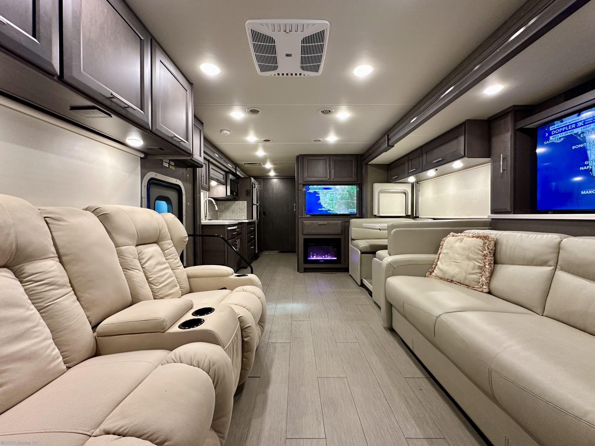 2021 Thor Motor Coach Palazzo 37.4 - Used Diesel Pusher For Sale by Glades RV in Fort Myers, Florida features Day/Night Shades, Residential Refrigerator, Televator TV, Fireplace, Power Entrance Step