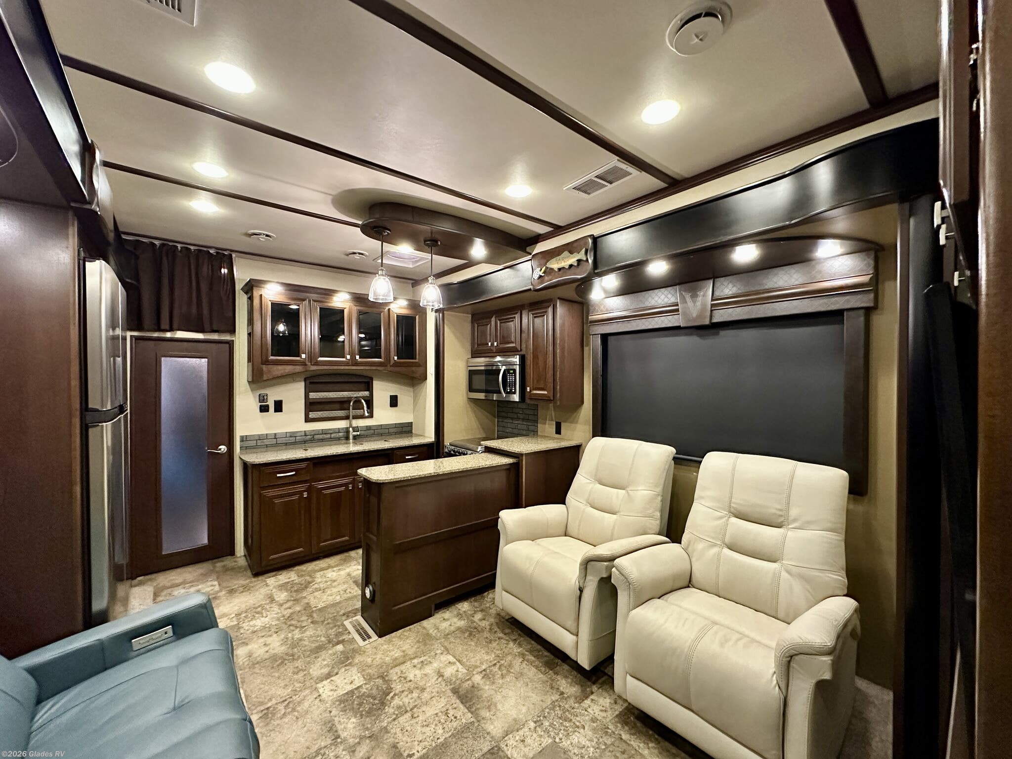 2016 Dutchmen Voltage 3970 - Used Fifth Wheel For Sale by Glades RV in Fort Myers, Florida features Pantry, Outside Entertainment Center, Detachable Power Cord, Automatic Leveling Jacks, Fireplace