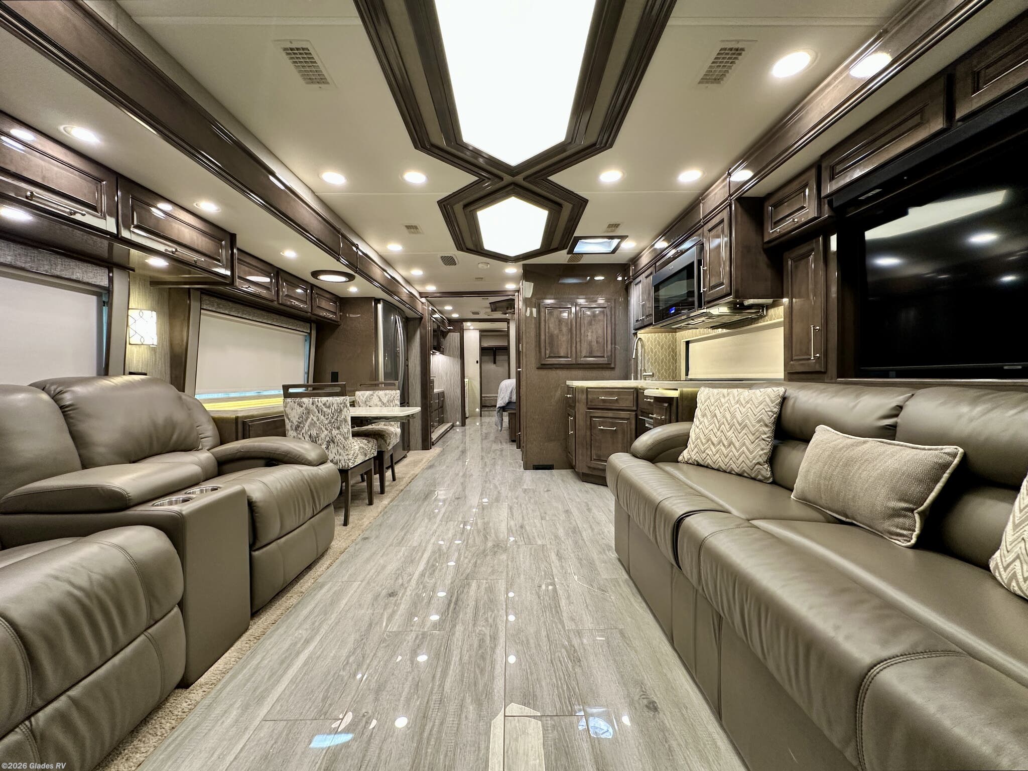 2021 Entegra Coach Aspire 44F - Used Diesel Pusher For Sale by Glades RV in Fort Myers, Florida features Glass Shower Door, Central Vacuum, Automatic Leveling Jacks, Power Entrance Step, Residential Refrigerator