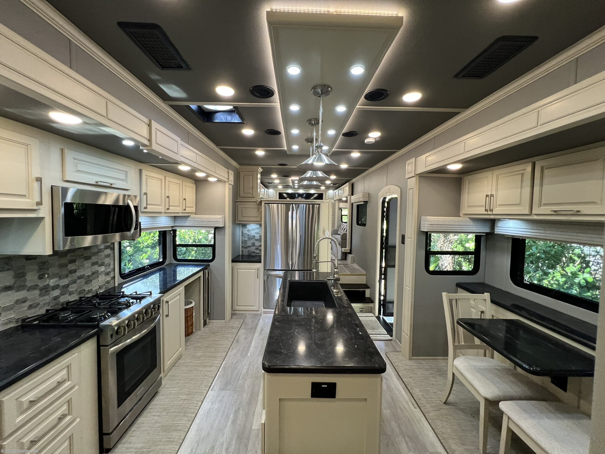2023 Luxe Elite 44FL - Used Fifth Wheel For Sale by Glades RV in Fort Myers, Florida features Generator, Side View Cameras, 50 Amp Service, Automatic Leveling Jacks, Tankless Demand Gas Water Heater