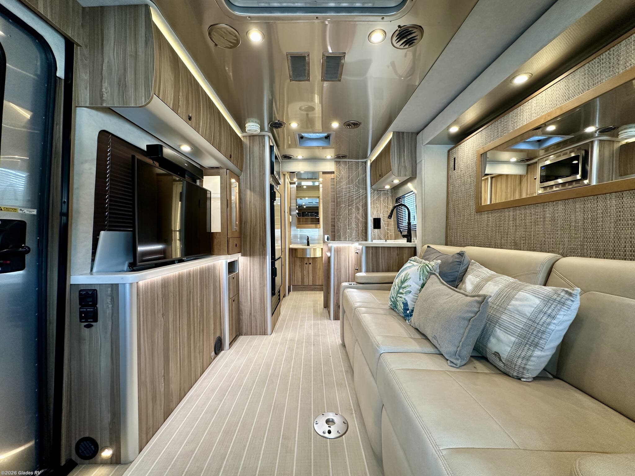 2021 Airstream Atlas Tommy Bahama - Used Class C For Sale by Glades RV in Fort Myers, Florida features 30 Amp Service, Power Entrance Step, Full Body Paint, Backup Monitor, Corian Countertops