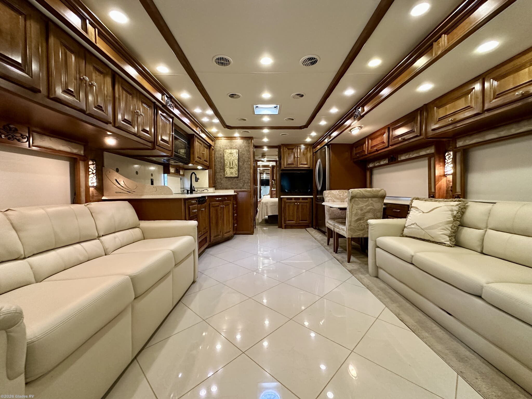 2012 Tiffin Phaeton 40 QBH - Used Diesel Pusher For Sale by Glades RV in Fort Myers, Florida features Bath & 1/2, Power Entrance Step, Ceiling Fan, Keyless Entry, Dryer