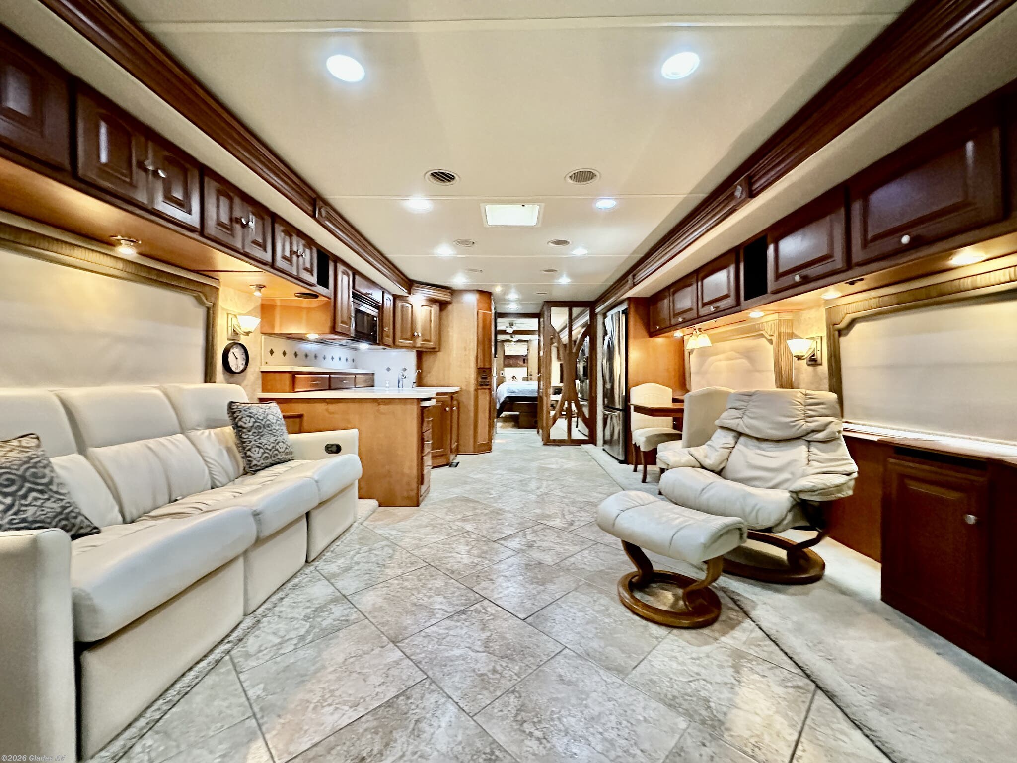 2011 Winnebago Journey Express 40U - Used Diesel Pusher For Sale by Glades RV in Fort Myers, Florida features Dryer, Outside Entertainment Center, Backup Monitor, Fireplace, Automatic Leveling Jacks