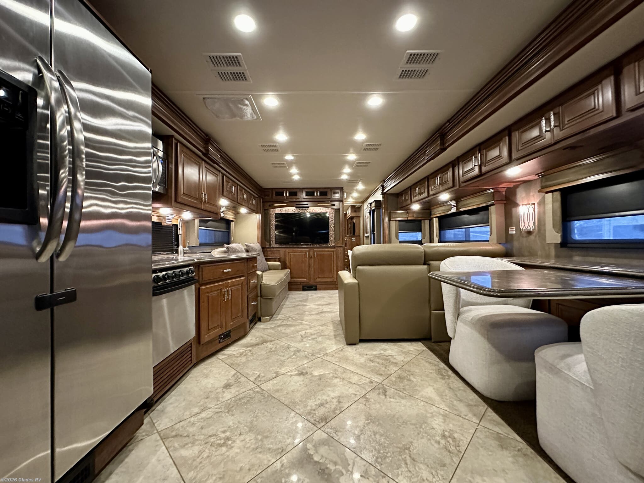 2014 Fleetwood Discovery 40X - Used Diesel Pusher For Sale by Glades RV in Fort Myers, Florida features Backup Camera, Day/Night Shades, Residential Refrigerator, Washer, Power Entrance Step