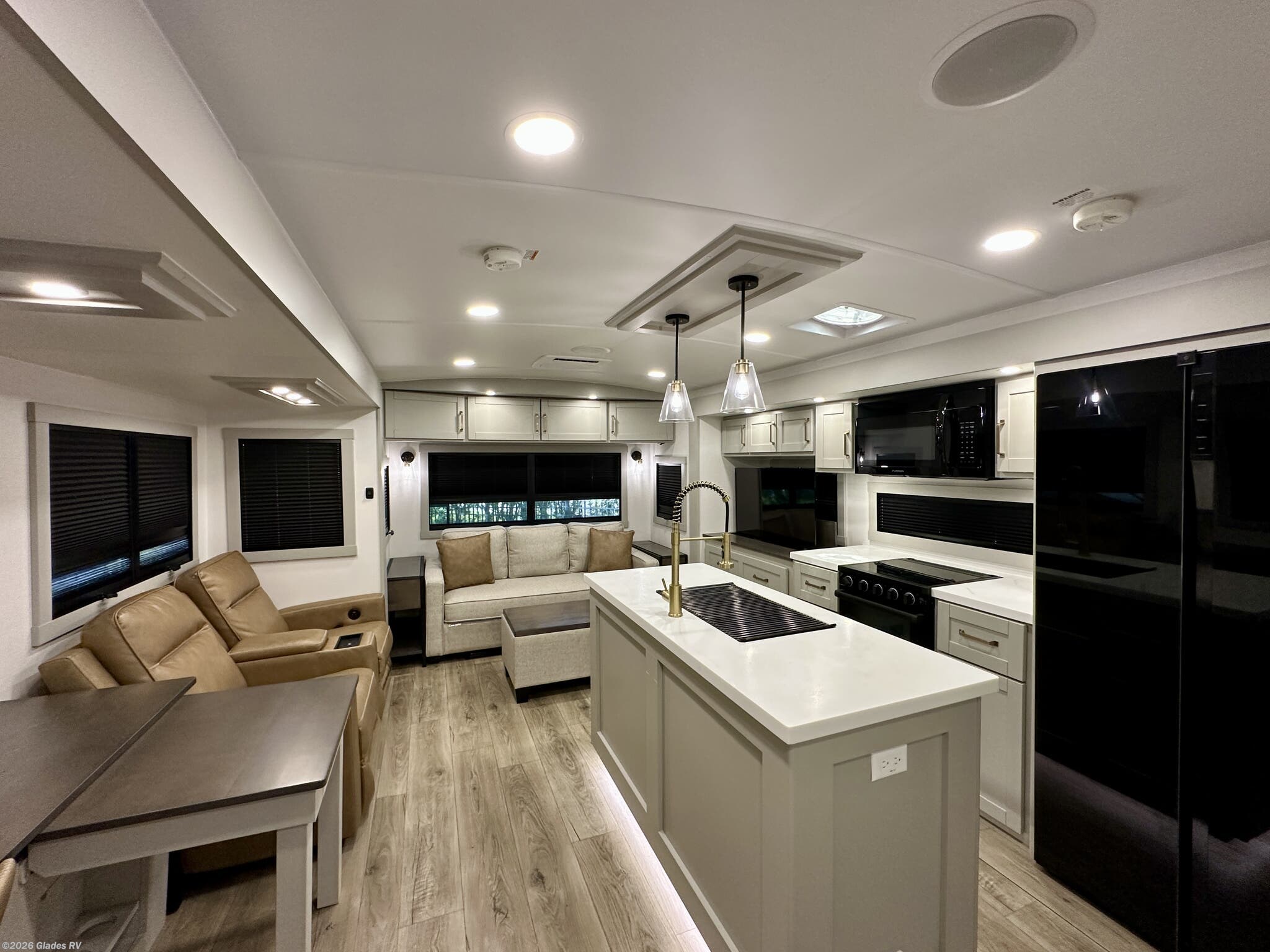 2025 Brinkley RV Model Z AIR 310 - Used Travel Trailer For Sale by Glades RV in Fort Myers, Florida features Second Roof A/C, Televator TV, Solid Surface Countertops, Oven, Tankless Demand Gas Water Heater