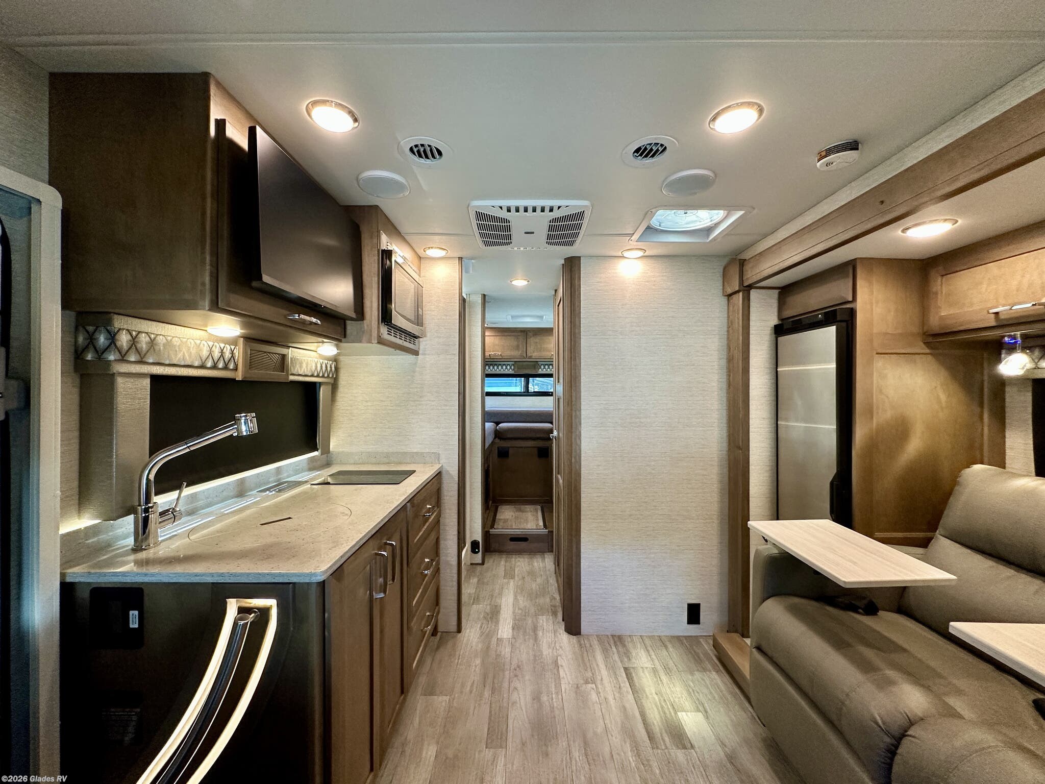 2024 Tiffin Wayfarer 25 LW - Used Class C For Sale by Glades RV in Fort Myers, Florida features Solid Surface Countertops, Exterior Speakers, Power Seats, Smart TV, Keyless Entry