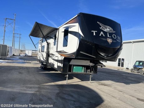 In pursuit of family fun on the road? Look no further than this **Used 2019 Jayco Talon Platinum 392T Toy Hauler **! Stock #8F0078.

Exterior Features:
Weights
Dry Hitch Weight (lbs)2,760
Unloaded Vehicle Weight (lbs)12,235
Cargo Carrying Capacity (lbs)4,665
Gross Vehicle Weight Rating (lbs)16,900
Measurements
Exterior Length (overall)40&#39; 11&quot;
Exterior Height (with A/C)13&#39; 6&quot;
Exterior Width8&#39; 6&quot;
Interior Height (main)7&#39; 5&quot;
Tank Capacities
Fresh Water Capacity (gals)142.0
Gray Water Capacity (gals)87.0
Black Tank Capacity (gals)50.0

Interior Features
Air Conditioning
Standard
Kitchen Dinette
Pedestal Table
Interior Flooring Type
Vinyl
Master Bedroom
Standard
Number Of Bathrooms
1
Shower
Standard
Television
Standard
DVD Player
Standard

Popular Accessories Add-Ons:
Owner&#39;s Kit
Water Filtration System
Exterior Ladder Upgrade
Maxx Air Vent Covers
Backup Cameras
Generators
Much, Much More

Ultimate Transportation in Fargo, ND provides a full line of camper parts and RV accessories along with a full RV service department. A few of these services include winterization, diagnostics, general repair, aftermarket installation, and much more. 

Not seeing the floorplan you&#39;re looking for? We&#39;re happy to work with you to order the custom camper, toy hauler, or ice house that&#39;s right for you. We have a variety of manufacturers such as Grand Design RV, Heartland RV, Forest River XLR Toy Haulers, Ice Castle Rugged RV, and Team Lodge. Check out our showrooms here: https://www.ultimate-transportation.com/recreation/showroom. 
Give us a call at 701-282-6060 or fill out a request form on our website to have our recreational sales team get in contact with you.