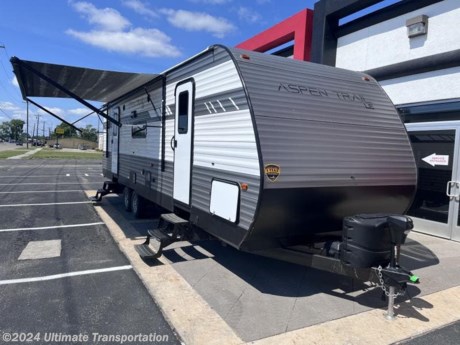 In pursuit of family fun on the road? Look no further than this Used 2022 Dutchmen Aspen Trail LE 29BB! Stock #921055

Sleeps-3-6
Length-33&#39; 10&quot;
Height (with AC)-11&#39; 3&quot;
Shipping Weight (Average)-6,404 lbs.
Hitch-817 lbs.
Axles-2
Cargo Carrying Capacity-2,476 lbs.
Fresh Water Capacity-46 gals.
Grey Water Capacity-42 gals.
Waste Water Capacity-42 gals.
Awning Length-18&#39;
Refrigerator Size-7 cu ft

Popular Accessories Add-Ons:
Owner&#39;s Kit
Water Filtration System
Exterior Ladder Upgrade
Maxx Air Vent Covers
Backup Cameras
Generators
Much, Much More

All used campers &amp; ice houses sold by Ultimate Transportation are sold AS IS with no warranty. Inspections &amp; services are available for additional cost. Used units are priced appropriately knowing the potential for service work needed. 

Ultimate Transportation in Fargo, ND provides a full line of camper parts and RV accessories along with a full RV service department. A few of these services include winterization, diagnostics, general repair, aftermarket installation, and much more. 

Not seeing the floorplan you&#39;re looking for? We&#39;re happy to work with you to order the custom camper, toy hauler, or ice house that&#39;s right for you. We have a variety of manufacturers such as Grand Design RV, Heartland RV, Forest River XLR Toy Haulers, Ice Castle Rugged RV, and Team Lodge. Check out our showrooms here: https://www.ultimate-transportation.com/recreation/showroom. 
Give us a call at 701-282-6060 or fill out a request form on our website to have our recreational sales team get in contact with you.