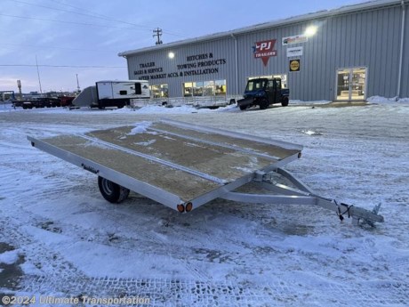 POST SEASON SNOWMOBILE TRAILER DISCOUNTS-ALL SNOW TRAILERS AT OR BELOW DEALER COST. ALL UNITS MUST GO!!!

Ultimate Transportation in Fargo, ND has a New Triton 10&#39; Tilt Snowmobile Trailer for sale. Check out this trailer&#39;s details below!

Standard Features:-Torsion Axle-2&quot; Coupler-(2) Ski Tie Downs-1/2&quot; Marine Grade Plywood-Sealed LED Lights-Full Length Quickslides

*Might be pictured with optional spare tire &amp; carrier mount.*

Ultimate Transportation in Fargo, North Dakota has everything you need when it comes to trailers. We sell utility trailers, enclosed trailers, dump trailers, race trailers, equipment trailers and more. Our popular trailer brands include inTech, United Trailers, PJ Trailers, Impact, NEO, Bear Track &amp; more.

Ultimate Transportation also has a full parts &amp; service department. Don&#39;t forget to shop our popular trailer parts including toolboxes, spare tires, extra lug nuts, and more! Ask your Trailer Sales Expert or our parts department for recommendations for your trailer. 

For over 25 years, Ultimate Transportation has been the area&#39;s leader for custom-built trailers. Whether you&#39;re looking for a car hauler racing trailer with all the bells and whistles, or wanting to create the ultimate tailgating trailer experience, Ultimate Transportation can help with your custom trailer order!

Call Ultimate Transportation at 701-282-6060 and talk with our trailer sales team today!
