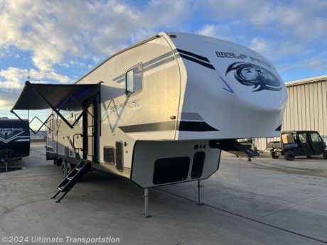 In pursuit of family fun on the road? Look no further than this Used 2019 Forest River Cherokee Wolfpack 295PACK13 Fifth Wheel Toy Hauler! Stock #212721.
Exterior Features:
Dimensions
Length
38.5 ft. (462 in.)
Width
8.5 ft. (102 in.)
Height
13.42 ft. (161 in.)
Weight
Dry Weight
10,820 lbs.
Payload Capacity
3,718 lbs.
GVWR
14,538 lbs.
Hitch Weight
2,538 lbs.
Holding Tanks
Number Of Fresh Water Holding Tanks
2
Total Fresh Water Tank Capacity
100 gal.
Number Of Gray Water Holding Tanks
1
Total Gray Water Tank Capacity
38 gal.
Number Of Black Water Holding Tanks
1
Total Black Water Tank Capacity
38 gal.
Propane Tank(s)
Number Of Propane Tanks
2
Total Propane Tank Capacity
9 gal.
Total Propane Tank Capacity
40 lbs.
Construction
Body Material
Aluminum
Sidewall Construction
Aluminum
Doors
Number of Doors
2
Sliding Glass Door
No
Slideouts
Number of Slideouts
1
Power Retractable Slideout
Yes
Awning
Number of Awnings
1
Awning Length
21 ft. (252 in.)
Power Retractable Awning
Yes
Screened Room
No
Interior Features:
Kitchen / Living Area
Kitchen / Living Area Flooring Type
Carpet / Vinyl
Kitchen Table Configuration
U-shaped Dinette
Kitchen Location
Center
Living Area Location
Center
Oven / Stove
Layout
Oven / Stove
Number Of Oven Burners
3
Overhead Fan
Yes
Refrigerator
Refrigerator Size
Mid-Size
Refrigerator Power Mode
Electric / Propane
Sofa
Number Of Sofas
2
Sofa Material
Vinyl
Reclining Sofa
No
Recliners / Rockers
Number Of Recliner / Rockers
1
Beds
Max Sleeping Count
10
Number Of Bunk Beds
0
Number Of Double Beds
0
Number Of Full Size Beds
0
Number Of Queen Size Beds
2
Number Of King Size Beds
1
Number Of Convertible / Sofa Beds
2
Master Bedroom
Master Bedroom Flooring Type
Carpet
Master Bedroom Door Style
Conventional Door
Full Size Master Bedroom Closet
No
Master Bedroom Mirror Doors
No
Master Bedroom Shades / Curtains
Yes
Master Bedroom Location
Front
Bunkhouse
No
Bathroom
Number Of Bathrooms
1
Bathroom Flooring Type
Vinyl
Bathroom Location
Center
Toilet
Toilet Type
Plastic
Toilet Location
Center
Shower
Door Type
Plastic / Glass
Shower Location
Center
Bathroom Sink
Bathroom Sink Location
Center
Bathroom Medicine Cabinet
Bathroom Medicine Cabinet Location
Center
Bathroom Mirror
Bathroom Mirror Location
Center
Bathroom Vent / Fan System
Bathroom Vent / Fan System Location
Center
Cargo Area Dimensions
Cargo Area Length
13 ft. (156 in.)
Cargo Area Length (mm)
3962.4
Cargo Area Width
8.5 ft. (102 in.)
Cargo Area Width (mm)
2590.8
Cargo Area Height
13.42 ft. (161 in.)
Cargo Area Height (mm)
4089.4
Cargo Area Flooring Type
Rubber
Cargo Area Rear Door
Cargo Area Rear Door Style
Ramp Door
Cargo Area Side Door
Cargo Area Side Door Style
Conventional
Cargo Area Auxiliary Gas Tank
Cargo Area Auxiliary Gas Tank Capacity
30 gal.
Cargo Area Auxiliary Gas Tank Capacity
114 lbs.
Wheels
Wheels Composition
Aluminum
Number Of Axles
2
Tires
Rear Tire (Full Spec)
ST225/75R 15
Spare Tire
Spare Tire Location
Exterior Mounted
Brakes
Front Brake Type
Not Applicable
Rear Brake Type
Electric Drum
Battery
Battery Power Converter
Yes
Prewiring
Air Conditioning Prewiring
Yes
Cable Prewiring
Yes
Phone Prewiring
No
Heat Prewiring
Yes
TV Antenna Prewiring
Yes
Satellite Prewiring
Yes
Washer / Dryer Prewiring
Yes
Air Conditioning
Air Conditioning Type
Automatic
Air Conditioning
13,500 BTUs
Heater
Heater Type
Automatic
Heater
35,000 BTUs
Water Heater Tank
Water Heater Tank Capacity
6 g
Water Heater Pump Power Mode
Electrical / Propane
Water Heater Tank Bypass
Yes
Emergency Exit(s)
Number Of Emergency Exits
1
Radio
Number Of Radios
1
Satellite
No
Speakers
Speaker Location(s)
Interior
Surround Sound
Yes
CD Player
Number Of Discs
1
Television
Number Of Televisions
1
Paint
Primary Color
Silver
Secondary Color
White
Metallic
No
Paint Swatch File Name
Forest River/White-BlackExteriorColor.gif
Interior Decor
Wallpaper
Yes
Interior Wood Finish
Yes
Exterior Patio / Deck
Exterior Patio / Deck Location
Rear
Popular Accessories Add-Ons:
Owner&#39;s Kit
Water Filtration System
Exterior Ladder Upgrade
Maxx Air Vent Covers
Backup Cameras
Generators
Much, Much More
Ultimate Transportation in Fargo, ND provides a full line of camper parts and RV accessories along with a full RV service department. A few of these services include winterization, diagnostics, general repair, aftermarket installation, and much more. 
Not seeing the floorplan you&#39;re looking for? We&#39;re happy to work with you to order the custom camper, toy hauler, or ice house that&#39;s right for you. We have a variety of manufacturers such as Grand Design RV, Heartland RV, Forest River XLR Toy Haulers, Ice Castle Rugged RV, and Team Lodge. Check out our showrooms here: https://www.ultimate-transportation.com/recreation/showroom. 
Give us a call at 701-282-6060 or fill out a request form on our website to have our recreational sales team get in contact with you.