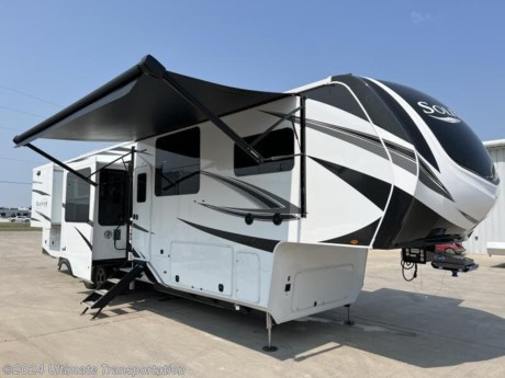 In pursuit of family fun on the road? Look no further than this New 2024 Grand Design Solitude 390RK Fifth Wheel!

Exterior Features:
Exterior Spray Port (Door Side)
Front Cap Windshield (380FL, 382WB)
King Jack Antenna
High-Gloss Gel Coat Exterior Sidewalls
Color Matched Fender Skirt
TPO Roof Covering w/ Limited Lifetime Warranty
Slam-Latch Baggage Doors
Magnetic Entry and Baggage Door Catches
Entry Door w/Privacy Glass
Frameless Tinted Windows
Painted Gel Coat Fiberglass Front Cap
Roof Ladder
17.5&quot; Spare Tire (Undermount)
Power Patio Awning with Integrated LED Lighting
Sewer Hose Storage Area
Easy Clean Solid Surface Steps
Keyed Alike
SolidStep Quad Entry Steps

Interior Features:
Double Tri-Fold Hide-A-Bed Sofas (375RES, 378MBS, 380FL, 382WB, 390RK)
Leaded Glass Cabinet Door Inserts (Select Areas)
Under Step Shoe Storage (Most Models)
Plywood Drawer Bottoms
Premium Roller Shades
Hardwood Window Treatments
Congoleum Flooring w/3-Year Warranty
Hallway Handrail
Hardwood Cabinet Doors
Signature Wall Mounted Dinette Table w/4 Padded Chairs
Theatre Seating
Tri-Fold Hide-A-Bed Sofa
Smoke Detector, LP Alarm, Carbon Monoxide Alarm

Popular Accessories Add-Ons:
Owner&#39;s Kit
Water Filtration System
Exterior Ladder Upgrade
Maxx Air Vent Covers
Backup Cameras
Generators
Much, Much More

Ultimate Transportation in Fargo, ND provides a full line of camper parts and RV accessories along with a full RV service department. A few of these services include winterization, diagnostics, general repair, aftermarket installation, and much more. 

Not seeing the floorplan you&#39;re looking for? We&#39;re happy to work with you to order the custom camper, toy hauler, or ice house that&#39;s right for you. We have a variety of manufacturers such as Grand Design RV, Heartland RV, Forest River XLR Toy Haulers, Ice Castle Rugged RV, and Team Lodge. Check out our showrooms here: https://www.ultimate-transportation.com/recreation/showroom. 
Give us a call at 701-282-6060 or fill out a request form on our website to have our recreational sales team get in contact with you.