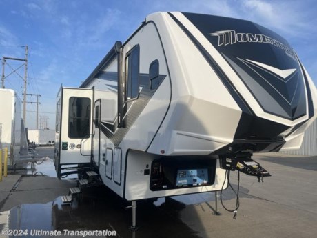 In pursuit of family fun on the road? Look no further than this New 2024 Grand Design Momentum 350G Fifth Wheel Toy Hauler!

Virtual Tour: https://virtualtour.granddesignrv.com/tours/klJFTFdfP

EXTERIOR
Black Tank Flush
Full Sized Spare Tire &amp; Carrier
80% Tint Radius Safety Glass Windows
30lb LP Bottles (2)
Radius Entry Door
High-Capacity Water Pump
Extra Large 1 1/2&quot; Fresh Water Drain Valve
Battery Disconnect Switch
Folding Roof Ladder
Gel Coated Fiberglass Exterior
Easy Access Low Point Drain Valves
Insulated Storage Doors
Large Panoramic Windows
Magnetic Storage and Entry Door Latches
Awning w/LED Accent Lighting
Under Unit Accent Lighting
 
CONSTRUCTION
Oversized Tank Capacities
One-Piece TPO Roof Membrane w/ Limited Lifetime Warranty
Laminated Aluminum Framed Rear Ramp Door (R-7)
Laminated Aluminum Framed Side Walls (R-11)
Laminated Aluminum Framed Roof and End Walls in Slide Rooms (R-7)
1&quot; Marine Grade OSB Floor (R-30*)
5&quot; Radius Wood Framed Roof (R-40*)
 
RUNNING GEAR
Upgraded Axle Hangers
Heavy Duty H-Rated Tires
Heavy Duty 7,000lb. Axles with ABS Brakes
17.5&quot; H-Rated Aluminum Wheels
MORryde CRE3000 Suspension System
Anti-Lock Brake System
 
FRAME &amp; CHASSIS
Electric Auto Leveling System
101&quot; Wide-Body Super Chassis

INTERIOR
Under Counter Accent Lighting
Above Cabinet Accent Lighting
Solid Hardwood Drawer Fronts
Solid Core Cabinet Stiles
Pre-Drilled and Screwed Cabinetry
Ball Bearing Full Extension Drawer Glides
Night Shades (All Windows)
Upgraded Residential Furniture
Residential Countertops
Plywood Drawer Bottoms (N/A 315G)
 
KITCHEN
Microwave
Residential Kitchen Faucet
Stainless Steel Accented 3-Burner Range with Oven
Glass Range Cover (Flush w/Counter Top)
12-Volt High Power MaxxAir Fan with Rain Sensor
 
ELECTRICAL
Solar Prep (10-Gauge Wiring with universal MC4 Connectors)
75 Amp Converter
12V Battery Disconnect
 
HVAC
12v High Power Fan (Kitchen)
35k BTU High Capacity Furnace
Fireplace w/5000 BTU Electric Heater
Main A/C with Race Track Ducting
Attic Vent
High-Capacity Heat Ducts
PLUMBING
Sewer Hose Storage Area
All-In-One Enclosed and Heated Utility Center
 
BEDROOM
Night Stands
Bedside Outlets
USB Chargers
Solid Bedroom Door
Residential Bedspread
TV and Cable Prep
 
BATHROOM
Residential Walk-In Shower
Skylight Over Shower
Power Vent Fan
Medicine Cabinet with Mirror
 
APPLIANCE
Fireplace with Electric Heater
Stainless Steel Refrigerator
Microwave
 
ELECTRONICS
Back-Up Camera Prep
Exterior Cable/Satellite Plug In
LED Smart TV in Living Area
Rockford Fosgate Stereo Entertainment System w/HDMI and App Controls
Exterior Speakers
No-Crank Digital TV Antenna w/Booster
TV Prep in Garage

Popular Accessories Add-Ons:
Owner&#39;s Kit
Water Filtration System
Exterior Ladder Upgrade
Maxx Air Vent Covers
Backup Cameras
Generators
Much, Much More

Ultimate Transportation in Fargo, ND provides a full line of camper parts and RV accessories along with a full RV service department. A few of these services include winterization, diagnostics, general repair, aftermarket installation, and much more. 

Not seeing the floorplan you&#39;re looking for? We&#39;re happy to work with you to order the custom camper, toy hauler, or ice house that&#39;s right for you. We have a variety of manufacturers such as Grand Design RV, Heartland RV, Forest River XLR Toy Haulers, Ice Castle Rugged RV, and Team Lodge. Check out our showrooms here: https://www.ultimate-transportation.com/recreation/showroom. 
Give us a call at 701-282-6060 or fill out a request form on our website to have our recreational sales team get in contact with you.