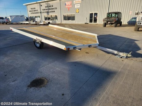 Ultimate Transportation in Fargo, ND has a **New Triton 8.5&#39;X12&#39; Drive on Drive Off Open Snowmobile Trailer ** for sale. Check out this trailer&#39;s details below! Stk#V18795

Standard Features:-2 Place-Quick Slides w/ 2 Tie Down Bars-Fully Welded Box Frame-LED Lights-1/2&quot; Deck-Torsion Suspension-Aluminum Deck Protector-Custom Molded Wiring Harness


*Might be pictured with optional spare tire &amp; carrier mount.*

Ultimate Transportation in Fargo, North Dakota has everything you need when it comes to trailers. We sell utility trailers, enclosed trailers, dump trailers, race trailers, equipment trailers and more. Our popular trailer brands include inTech, United Trailers, PJ Trailers, Impact, NEO, Bear Track &amp; more.

Ultimate Transportation also has a full parts &amp; service department. Don&#39;t forget to shop our popular trailer parts including toolboxes, spare tires, extra lug nuts, and more! Ask your Trailer Sales Expert or our parts department for recommendations for your trailer. 

For over 25 years, Ultimate Transportation has been the area&#39;s leader for custom-built trailers. Whether you&#39;re looking for a car hauler racing trailer with all the bells and whistles, or wanting to create the ultimate tailgating trailer experience, Ultimate Transportation can help with your custom trailer order!

Call Ultimate Transportation at 701-282-6060 and talk with our trailer sales team today!