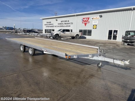Ultimate Transportation in Fargo, ND has a New 8&#39;6&quot;X22&#39; Drive On-Drive Off Snowmobile Trailer for sale. Check out this trailer&#39;s details below! Stock # 122638

Standard Features:-264&quot; Bed Length-Fully Welded Box Frame-Torsion Suspension-5/8&quot; Marine Grade Plywood-Quick Slides-Sealed LED Lights-Sure Lock Tie Downs

Additional Upgrades Included:-Electric Brake Axles

*Might be pictured with optional spare tire &amp; carrier mount.*

Ultimate Transportation in Fargo, North Dakota has everything you need when it comes to trailers. We sell utility trailers, enclosed trailers, dump trailers, race trailers, equipment trailers and more. Our popular trailer brands include inTech, United Trailers, PJ Trailers, Impact, NEO, Bear Track &amp; more.

Ultimate Transportation also has a full parts &amp; service department. Don&#39;t forget to shop our popular trailer parts including toolboxes, spare tires, extra lug nuts, and more! Ask your Trailer Sales Expert or our parts department for recommendations for your trailer. 

For over 25 years, Ultimate Transportation has been the area&#39;s leader for custom-built trailers. Whether you&#39;re looking for a car hauler racing trailer with all the bells and whistles, or wanting to create the ultimate tailgating trailer experience, Ultimate Transportation can help with your custom trailer order!

Call Ultimate Transportation at 701-282-6060 and talk with our trailer sales team today!