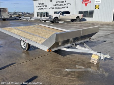 Ultimate Transportation in Fargo, ND has a New 8&#39;6&quot;X12&#39; Tilt Snowmobile Trailer for sale. Check out this trailer&#39;s details below! Stock # 126514

Standard Features:-144&quot; Bed Length-Fully Welded Box Frame-Torsion Suspension-1/2&quot; Marine Grade Plywood-Quick Slides-Sealed LED Lights-Sure Lock Tie Downs

Additional Upgrades Included:


*Might be pictured with optional spare tire &amp; carrier mount.*

Ultimate Transportation in Fargo, North Dakota has everything you need when it comes to trailers. We sell utility trailers, enclosed trailers, dump trailers, race trailers, equipment trailers and more. Our popular trailer brands include inTech, United Trailers, PJ Trailers, Impact, NEO, Bear Track &amp; more.

Ultimate Transportation also has a full parts &amp; service department. Don&#39;t forget to shop our popular trailer parts including toolboxes, spare tires, extra lug nuts, and more! Ask your Trailer Sales Expert or our parts department for recommendations for your trailer. 

For over 25 years, Ultimate Transportation has been the area&#39;s leader for custom-built trailers. Whether you&#39;re looking for a car hauler racing trailer with all the bells and whistles, or wanting to create the ultimate tailgating trailer experience, Ultimate Transportation can help with your custom trailer order!

Call Ultimate Transportation at 701-282-6060 and talk with our trailer sales team today!