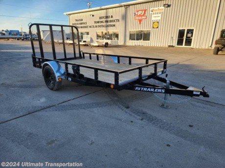 Ultimate Transportation in Fargo, ND has a New PJ 77&quot;X12&#39; Utility Trailer for sale. Check out this trailer&#39;s details below! Stock # 663566

Standard Features:-3,500lb Spring Axle Rated at 2,990lb-ST205/75/R15 Black Mods-Spare Tire Mount-4&#39; Fold in Gate-2&quot;X6&quot; Green Treated Floor-Powder Coated


*Might be pictured with optional spare tire &amp; carrier mount.*

Ultimate Transportation in Fargo, North Dakota has everything you need when it comes to trailers. We sell utility trailers, enclosed trailers, dump trailers, race trailers, equipment trailers and more. Our popular trailer brands include inTech, United Trailers, PJ Trailers, Impact, NEO, Bear Track &amp; more.

Ultimate Transportation also has a full parts &amp; service department. Don&#39;t forget to shop our popular trailer parts including toolboxes, spare tires, extra lug nuts, and more! Ask your Trailer Sales Expert or our parts department for recommendations for your trailer. 

For over 25 years, Ultimate Transportation has been the area&#39;s leader for custom-built trailers. Whether you&#39;re looking for a car hauler racing trailer with all the bells and whistles, or wanting to create the ultimate tailgating trailer experience, Ultimate Transportation can help with your custom trailer order!

Call Ultimate Transportation at 701-282-6060 and talk with our trailer sales team today!