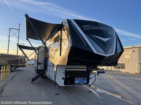In pursuit of family fun on the road? Look no further than this New Grand Design Momentum 410TH Toy Hauler! Stock #B01877.

Exterior Features:
EXTERIOR
Keyed Alike Ramp Door Latches
2nd Patio Awning w/ LED Lights
3rd Awning w/ LED Lights (Main Slide-397THS &amp; 410TH)
Interior Color Changing LED Accent Lighting
High-Gloss Gel Coat Exterior Sidewalls
Door Side Exterior Spray Port
Frameless Tinted Windows
Walk-On Roof
17.5&quot; Spare Tire (Undermount)
Solid Step Quad Entry Step
Slam-Latch Baggage Doors
Mo-Secure
60 Gallon Fuel Station w/Interior and Exterior Gauge
 
CONSTRUCTION
101&quot; Wide Body Construction
5-Side Aluminum Cage Construction
Fully Enclosed and Heated, Underbelly and Storage Area
 
RUNNING GEAR
Upgraded Axle Hangers
Heavy Duty H-Rated Tires
Heavy Duty 7,000 lb. Axles with ABS Brakes
17.5&quot; H-Rated Aluminum Wheels
MORryde CRE3000 Suspension System
Anti-Lock Brake System
 
FRAME &amp; CHASSIS
6-Point Hydraulic Leveling System
MORryde Pin Box
101&quot; Wide Body Super Chassis w/Drop-Frame Storage

Interior Features:
INTERIOR
Interior Color Changing LED Accent Lighting
Hardwood Cabinet Doors w/Hidden Hinges
Sofa w/Headrest (Includes Heat, Massage &amp; LED Lighting Package
Central Vacuum System w/ Tools and Dust Pan
Plywood Drawer Bottoms
 
KITCHEN
Microwave
Residential Kitchen Faucet
Professional Grade Stainless Steel Cooktop
12-Volt High Power MaxxAir Fan w/Rain Sensor
Window Behind Range
Kitchen Barstools w/ Extended Countertops (397THS, 399TH, &amp; 410TH)
 
ELECTRICAL
Solar Prep (10 gauge wiring with universal MC4 connectors)
75 Amp Converter
12V Battery Disconnect
 
HVAC
12V High Power Fan (Kitchen)
35k BTU High Capacity Furnace
Fireplace w/ 5,000 BTU Electric Heater
StealthAC Smart AC System
Attic Vent
High Capacity Heat Ducts
PLUMBING
Exterior Spray Port (Door Side)
12V Tank Heaters
Sewer Hose Storage Area
Whole House Water Filtration System
All-In-One Enclosed and Heated Utility Center
 
BEDROOM
Under Bed Storage Area (N/A 376THS)
Individually Switched Reading Lights Over Bed
Bedside 110-Volt &amp; USB Outlets
Window Above Master Bed Headboard
60&quot; X 80&quot; Queen Bed Pillow Top Bed Mattress
 
BATHROOM
Skylight Above Shower
Porcelain Toilet
Medicine Cabinet w/Mirrored Door (N/A 410TH)
Undermount Lav Sink
One-Piece Fiberglass Shower w/Glass Door &amp; Teak Bench Seat
 
APPLIANCE
Fireplace with Electric Heater
Stainless Steel 20 cu. ft. Refrigerator
30&quot; Over-The-Range Microwave
 
ELECTRONICS
OneControl System
Back-Up Camera Prep
Exterior Cable/SAT Plug-In
LED Smart TV in Living Area
LED TV in Bedroom
Rockford Fosgate Stereo Entertainment System w/HDMI and App Controls
Exterior Speakers
No-Crank Digital TV Antenna w/Booster
LED TV in Garage (N/A 376THS)

Specifications:
OVERALL SIZE
Exterior Height13&#39; 5&quot;
Exterior Height (w/opt. AC) 13&#39; 5&quot;
Exterior Length44&#39; 11&quot;
Exterior Width8&#39; 5&quot;
Exterior Width (w/ slide out)13&#39; 5&quot;
Interior HeightN/A
WEIGHTS
Hitch / Pin Weight3,600 lbs.
UVW16,800 lbs.
GVWR20,000 lbs.
CAPACITY
Fresh Water Capacity140 gal.
Grey Water Capacity104 gal.
Waste Water Capacity52 gal.
Propane Tanks2
LPG60
Sleeping Capacity6
Fuel Capacity60
APPLIANCES
Water HeaterOn-Demand 
Refrigerator20 cu. ft.
Furnace35 BTU
AC30,000 BTU
RUNNING GEAR
Axles3
Wheel Size17.50 in.
Tire SizeST215/75R17.5 LRH
CONSTRUCTION
Construction TypeAluminum Cage
Floor R-ValueR-45
Wall R-ValueR-11
Roof R-ValueR-40
Slide Room R-ValueR-11
Garage R-ValueR-40
DIMENSIONS
Standard Bed60 X 80 Queen Bed (King Opt.)
Standard BunkN/A
Shower48 X 30
Garage Length13&#39; 6&quot;
EXTERIOR
Slides3
Awnings3
Awning Length
16&#39;
12&#39;
10&#39;


Popular Accessories Add-Ons:
Owner&#39;s Kit
Water Filtration System
Exterior Ladder Upgrade
Maxx Air Vent Covers
Backup Cameras
Generators
Much, Much More

Ultimate Transportation in Fargo, ND provides a full line of camper parts and RV accessories along with a full RV service department. A few of these services include winterization, diagnostics, general repair, aftermarket installation, and much more. 

Not seeing the floorplan you&#39;re looking for? We&#39;re happy to work with you to order the custom camper, toy hauler, or ice house that&#39;s right for you. We have a variety of manufacturers such as Grand Design RV, Heartland RV, Forest River XLR Toy Haulers, Ice Castle Rugged RV, and Team Lodge. Check out our showrooms here: https://www.ultimate-transportation.com/recreation/showroom. 
Give us a call at 701-282-6060 or fill out a request form on our website to have our recreational sales team get in contact with you.