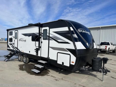 In pursuit of family fun on the road? Look no further than this New Grand Design Imagine 2800BH! Stock #648670.

Virtual Tour-https://virtualtour.granddesignrv.com/tours/Goa7sgMnq

Exterior Features:

EXTERIOR
Roof Ladder
Power Tongue Jack
80% Tint Radius Safety Glass Windows
20# LP Bottles (2) w/ Level Gauges
28&quot; Radius Entry Door
6&#39; Coily Hose Breakaway Cable
Adjustable Power Awning w/ LED Lights
Motion Sensor Entry LED Lighting
Spare Tire &amp; Carrier
Tuff-Ply Pass Thru Flooring
Sewer Hose Carrier
 
CONSTRUCTION
Gel Coated Fiberglass Exterior
One-Piece Roof Membrane with Limited Lifetime Warranty
Easy Access Low Point Drain Valves
Insulated Slam Latch Baggage Doors
Magnetic Storage and Entry Door Latches
Laminated Aluminum Framed Rear Wall (R-7)
Laminated Aluminum Framed Side Walls (R-7)
Laminated Aluminum Framed Roof and End Walls in Slide Rooms (R-7)
Laminated Aluminum Framed Main Floor (R-30)
5&quot; Radius Wood Framed Roof (R-40)
Laminated Aluminum Framed Roof &amp; End Walls in Slide Rooms &amp; Slide Floor (R-23)
Heated and Enclosed Underbelly with Suspended Tanks
Double Insulated Roof and Front Cap
Heated and Enclosed Dump Valves
Designated Heat Duct to Subfloor
High Density Roof Insulation with Attic Vent
Moisture Barrier Floor Enclosure
 
RUNNING GEAR
Tire Linc TPMS Prep
ABS
 
FRAME &amp; CHASSIS
2&#39;&#39; Accessory Hitch Receiver

Interior Features:
INTERIOR
Solid Drawer Fronts
Solid Core Cabinet Stiles
Pre-Drilled and Screwed Face Frames
Ball Bearing Full Extension Drawer Glides
Large Panoramic Windows
Upgraded Residential Furniture
Radius Ceiling with 81&quot; Tall Headroom
Wireless Pop-up Charger w/ 2 USB Outlets
 
KITCHEN
Sink Cover
Stainless Steel Sink
Residential Countertops
 
ELECTRICAL
Battery Kill Switch (Pass Thru)
165W Roof Mounted Solar Panel
Roof Mounted Quick Connect Plugs
40 AMP Charge Controller
LED Interior Lighting
Detachable Power Cord
Compass Connect
50 AMP Service
 
HVAC
Ducted Main AC
High Capacity Furnace
Residential Heating System Throughout (Ductless)
PLUMBING
Black Tank Flush
High-Capacity Water Pump
Extra Large 2&quot; Fresh Water Drain Valve
Oversized Tank Capacities
On Demand Tankless Water Heater
 
BEDROOM
Master Suite with 60&quot; x 80&quot; Queen Bed
Solid Bedroom Door (Master Suite)
Oversized Underbed Storage w/ Sliding Cargo Tray
Residential Bedspread w/ Headboard
Built-in Wardrobe Cubby Storage w/USB-C Charging Station &amp; 110V Outlet
Sliding Bed Storage Tray
 
BATHROOM
30&quot; x 36&quot; Residential Walk-In Shower with Skylight
Power Vent Fan
Medicine Cabinet with Mirror
 
APPLIANCE
3-Burner Range with Oven
Microwave
12V 10 Cu. Ft. Refrigerator
 
ELECTRONICS
Backup Camera Prep
TV and Cable Prep
Hi Definition LED TV
Exterior Cable Hookup

Specifications:
OVERALL SIZE
Exterior Height11&#39; 2&quot;
Exterior Height (w/opt. AC) 11&#39; 2&quot;
Exterior Length32&#39;
Exterior Width8&#39;
Exterior Width (w/ slide out)11&#39;
Interior Height81&quot;
WEIGHTS
Hitch / Pin Weight604
UVW6,386
GVWR8,495
CAPACITY
Fresh Water Capacity52
Grey Water Capacity82
Waste Water Capacity45
Propane Tanks2
LPG40
Sleeping Capacity10
APPLIANCES
Water HeaterTankless 
Refrigerator10 cu. ft.
Furnace35,000 BTU
AC15,000 BTU
RUNNING GEAR
Axles2
Wheel Size15 in.
Tire SizeST225/75R15LRE
CONSTRUCTION
Construction TypeAluminum Cage
Floor R-ValueR-30
Wall R-ValueR-7
Roof R-ValueR-40
Slide Room R-ValueR-7
DIMENSIONS
Standard Bed60 X 80 Queen Bed
Standard Bunk47x76
Shower30x36
EXTERIOR
Slides1
Awnings1
Awning Length19&#39;


Popular Accessories Add-Ons:
Owner&#39;s Kit
Water Filtration System
Exterior Ladder Upgrade
Maxx Air Vent Covers
Backup Cameras
Generators
Much, Much More

Ultimate Transportation in Fargo, ND provides a full line of camper parts and RV accessories along with a full RV service department. A few of these services include winterization, diagnostics, general repair, aftermarket installation, and much more. 

Not seeing the floorplan you&#39;re looking for? We&#39;re happy to work with you to order the custom camper, toy hauler, or ice house that&#39;s right for you. We have a variety of manufacturers such as Grand Design RV, Heartland RV, Forest River XLR Toy Haulers, Ice Castle Rugged RV, and Team Lodge. Check out our showrooms here: https://www.ultimate-transportation.com/recreation/showroom. 
Give us a call at 701-282-6060 or fill out a request form on our website to have our recreational sales team get in contact with you.