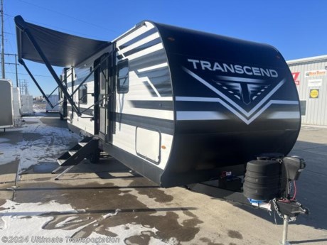 In pursuit of family fun on the road? Look no further than this New 2024 Grand Design Transcend 247BH Rear Bunks! Stock #829681.

Exterior Features:

EXTERIOR
Power Tongue Jack
Solar Power Inlet
Black Tank Flush
20# LP Bottles (2) with Cover
Friction Hinge Entry Door
Walk-on Roof
Easy Access Low Point Drain Valves
Spare Tire w/ Carrier
Magnetic Storage Door Catches
Extended Grab Handle
Rear Ladder
Tinted Windows
Upgraded STRONGWALL Metal Exterior
 
CONSTRUCTION
TPO Roof Membrane w/ Limited Lifetime Warranty
Insulated Storage Doors
Rear Wall Insulation (R-9)
Side Walls Insulation (R-9)
Slideroom Roof and End Wall Insulation (R-9)
Main Floor Insulation (R-11)
Roof Insulation (R-40)
Heated and Enclosed Underbelly w/ Suspended Tanks
Designated Heat Duct to Subfloor
Thermofoil over Roof &amp; Front Cap
Moisture Barrier Floor Enclosure
 
ELECTRICAL
Battery Kill Switch (Pass Thru)
USB Ports (2)
More Power Outlets
Dimmable LED Strip Lighting
Power Awning
Detachable Power Cord w/ LED Light
Motion Sensor Lights in Key Areas
165W Roof Mounted Solar Panel
Roof Mounted Quick Connect Plugs
40 AMP Charge Controller with Bluetooth
Interior Features:
INTERIOR
Large Solid Bedroom Door (Master Suite)
Power Vent Fan in Bath and Living Room
Solid Hardwood Drawer Fronts
Solid Core Cabinet Stiles
Pre-Drilled and Screwed Cabinetry
Ball Bearing Full Extension Drawer Glides
Residential Countertops
Upgraded Residential Furniture
78&quot; Interior Height
 
KITCHEN
Residential Booth Dinette
Residential Cabinet Doors
Deep Seated Stainless Steel Sink
 
BEDROOM
Residential Bedspread
Master Suite w/ 60&quot; x 80&quot; Queen Bed
E-Z Lift Bed Storage w/ Struts
 
BATHROOM
Walk-in Shower
Medicine Cabinet with Mirror
ABS Tub Surround
Foot Flush Toilet
PLUMBING
High-Capacity Water Pump
Extra Large 2&quot; Fresh Water Drain Valve
Oversized Tank Capacites
56 Gallon Fresh Water Capacity
High Rise Faucet with Pull Down Sprayer
E-Z Winterization
All-in-One Utility Center
 
ELECTRONICS
Cable/Sat Prep
AM/FM/Bluetooth Stereo
Exterior Speakers
Backup Camera Prep
HD LED TV
HD TV Antenna
 
APPLIANCE
Microwave
3-Burner Range with Oven
12V 8 Cu. Ft. Refrigerator
 
HVAC
35K BTU High Capacity Furnace
Attic Vent
Main A/C Ducted
EvenFlow Ductless Heating System Throughout


Specifications:

OVERALL SIZE
Exterior Height11&#39;
Exterior Height (w/opt. AC) N/A&#39;
Exterior Length29&#39; 11&quot;
Exterior Width8&#39;
Exterior Width (w/ slide out)N/A
Interior Height78&quot;
WEIGHTS
Hitch / Pin Weight583
UVW5,756
GVWR6,995
CAPACITY
Fresh Water Capacity56
Grey Water Capacity78
Waste Water Capacity39
Propane Tanks2
LPG40
Sleeping Capacity8
APPLIANCES
Water HeaterTankless 
Refrigerator8 cu. ft.
Furnace35 BTU
AC15,000 BTU
RUNNING GEAR
Axles2
Wheel Size15 in.
Tire SizeST205/75R15LRD
CONSTRUCTION
Construction TypeTraditional
Floor R-ValueR-11
Wall R-ValueR-9
Roof R-ValueR-40
Slide Room R-ValueR-9
DIMENSIONS
Standard Bed60 X 80 Queen Bed
Standard BunkN/A
Shower27&quot; x 36&quot;
EXTERIOR
SlidesN/A
Awnings1
Awning Length15&#39;


Popular Accessories Add-Ons:
Owner&#39;s Kit
Water Filtration System
Exterior Ladder Upgrade
Maxx Air Vent Covers
Backup Cameras
Generators
Much, Much More

Ultimate Transportation in Fargo, ND provides a full line of camper parts and RV accessories along with a full RV service department. A few of these services include winterization, diagnostics, general repair, aftermarket installation, and much more. 

Not seeing the floorplan you&#39;re looking for? We&#39;re happy to work with you to order the custom camper, toy hauler, or ice house that&#39;s right for you. We have a variety of manufacturers such as Grand Design RV, Heartland RV, Forest River XLR Toy Haulers, Ice Castle Rugged RV, and Team Lodge. Check out our showrooms here: https://www.ultimate-transportation.com/recreation/showroom. 
Give us a call at 701-282-6060 or fill out a request form on our website to have our recreational sales team get in contact with you.