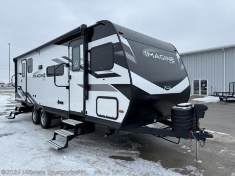 In pursuit of family fun on the road? Look no further than this New 2024 Grand Design Imagine XLS 24BSE! Stock #437443.

Exterior Features:
EXTERIOR
80% Tint Radius Safety Glass Windows
20# LP Bottles (2) w/ Level Gauges
28&quot; Radius Entry Door
Extra Large 2&quot; Fresh Water Drain Valve
Adjustable Power Awning w/ LED Lights
Power Tongue Jack
Aluminum Entry Steps
Spare Tire &amp; Carrier
6&#39; Coiled Break Away Cable
Front Rock Guard
Tuff-Ply Pass Thru Flooring
Sewer Hose Carrier
 
CONSTRUCTION
Gel Coated Fiberglass Exterior
One-Piece Roof Membrane with Limited Lifetime Warranty
Easy Access Low Point Drain Valves
Friction Hinge Entry Door
Magnetic Storage Door Catches
Laminated Aluminum Framed Rear Wall (R-7)
Laminated Aluminum Framed Side Walls (R-7)
Laminated Aluminum Framed Roof and End Walls in Slide Rooms (R-7)
Laminated Aluminum Framed Main Floor (R-30)
5&quot; Radius Wood Framed Roof (R-40)
Heated &amp; Enclosed Underbelly w/ Suspended Tanks
Double Insulated Roof &amp; Front Wall
Heated &amp; Enclosed Dump Valves
High Density Roof Insulation w/ Attic Vent
Moisture Barrier Floor Enclosure
 
RUNNING GEAR
Tire Linc TPMS Prep
Aluminum Rims
Anti-Lock Braking System
 
FRAME &amp; CHASSIS
2&#39;&#39; Accessory Hitch Receiver


Interior Features:
INTERIOR
Solid Drawer Fronts
Glass Cabinet Door Inserts (Select Overhead Cabinets)
Solid Core Cabinet Stiles
Pre-Drilled and Screwed Face Frames
Ball Bearing Full Extension Drawer Glides
Large Panoramic Window
Telescoping Dinette Table
LED Interior Lighting
Wireless Pop-Up Charger w/ 2 USB Outlets
 
KITCHEN
Sink Cover
Residential Countertops
Deep Seated Stainless Steel Sink
Residential Pulldown Sprayer Faucet
 
ELECTRICAL
Battery Kill Switch (Pass Thru)
Monitor Panel w/ One Touch Compass Connect
165W Roof Mounted Solar Panel
Roof Mounted Quick Connect Plugs
40 AMP Charge Controller
30 Amp Service
Detachable Power Cord
Motion Sensor LED Entry Lighting
 
HVAC
High Capacity Furnace
Designated Heat to Subfloor
Residential (Ductless) Heating System Throughout
Ducted Main A/C
PLUMBING
High-Capacity Water Pump
Oversized Tank Capacities
 
BEDROOM
Queen Murphy Bed w/ Storage Drawers (17MKE, 22BHE)
Residential Bedspread
Master Suite with Queen Bed (22MLE, 22RBE, 23LDE, 24BSE, 24SDE, 25DBE)
Built-in Wardrobe Cubby Storage w/USB-C Charging Station and 110V Outlet
 
BATHROOM
Residential Walk-In Shower
Skylight Over Shower
Power Vent Fan
Medicine Cabinet with Mirror
 
APPLIANCE
Microwave
3-Burner Range with Oven
12V 10 CU FT Refrigerator
 
ELECTRONICS
Backup Camera Prep
TV and Cable Prep
High Definition LED TV
Exterior Cable Hookup


Specifications:
OVERALL SIZE
Exterior Height10&#39; 10&quot;
Exterior Length28&#39; 8&quot;
Exterior Width8&#39;
Exterior Width (w/ slide out)N/A
Interior HeightN/A
WEIGHTS
Hitch / Pin Weight598
UVW5,923
GVWR6,995
CAPACITY
Fresh Water Capacity37
Grey Water Capacity82
Waste Water Capacity37
Propane Tanks2
LPG40
Sleeping Capacity4
APPLIANCES
Water HeaterTankless 
Refrigerator10 cu. ft.
Furnace25,000 BTU
AC15,000 BTU
RUNNING GEAR
Axles2
Wheel Size14 in.
Tire SizeST205/75R14LRD
CONSTRUCTION
Construction TypeAluminum Cage
Floor R-ValueR-30
Wall R-ValueR-7
Roof R-ValueR-40
Slide Room R-ValueR-7
DIMENSIONS
Standard Bed60 X 80 Queen Bed
Standard BunkN/A
Shower27 X 36
EXTERIOR
Slides2
Awnings1
Awning Length20&#39;


Popular Accessories Add-Ons:
Owner&#39;s Kit
Water Filtration System
Exterior Ladder Upgrade
Maxx Air Vent Covers
Backup Cameras
Generators
Much, Much More

Ultimate Transportation in Fargo, ND provides a full line of camper parts and RV accessories along with a full RV service department. A few of these services include winterization, diagnostics, general repair, aftermarket installation, and much more. 

Not seeing the floorplan you&#39;re looking for? We&#39;re happy to work with you to order the custom camper, toy hauler, or ice house that&#39;s right for you. We have a variety of manufacturers such as Grand Design RV, Heartland RV, Forest River XLR Toy Haulers, Ice Castle Rugged RV, and Team Lodge. Check out our showrooms here: https://www.ultimate-transportation.com/recreation/showroom. 
Give us a call at 701-282-6060 or fill out a request form on our website to have our recreational sales team get in contact with you.