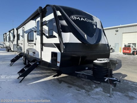 In pursuit of family fun on the road? Look no further than this New 2024 Grand Design Imagine 2660BS! Stock #649673.

Exterior Features:
EXTERIOR
Roof Ladder
Power Tongue Jack
80% Tint Radius Safety Glass Windows
20# LP Bottles (2) w/ Level Gauges
28&quot; Radius Entry Door
6&#39; Coily Hose Breakaway Cable
Adjustable Power Awning w/ LED Lights
Motion Sensor Entry LED Lighting
Spare Tire &amp; Carrier
Tuff-Ply Pass Thru Flooring
Sewer Hose Carrier
 
CONSTRUCTION
Gel Coated Fiberglass Exterior
One-Piece Roof Membrane with Limited Lifetime Warranty
Easy Access Low Point Drain Valves
Insulated Slam Latch Baggage Doors
Magnetic Storage and Entry Door Latches
Laminated Aluminum Framed Rear Wall (R-7)
Laminated Aluminum Framed Side Walls (R-7)
Laminated Aluminum Framed Roof and End Walls in Slide Rooms (R-7)
Laminated Aluminum Framed Main Floor (R-30)
5&quot; Radius Wood Framed Roof (R-40)
Laminated Aluminum Framed Roof &amp; End Walls in Slide Rooms &amp; Slide Floor (R-23)
Heated and Enclosed Underbelly with Suspended Tanks
Double Insulated Roof and Front Cap
Heated and Enclosed Dump Valves
Designated Heat Duct to Subfloor
High Density Roof Insulation with Attic Vent
Moisture Barrier Floor Enclosure
 
RUNNING GEAR
Tire Linc TPMS Prep
ABS
 
FRAME &amp; CHASSIS
2&#39;&#39; Accessory Hitch Receiver


Interior Features:

INTERIOR
Solid Drawer Fronts
Solid Core Cabinet Stiles
Pre-Drilled and Screwed Face Frames
Ball Bearing Full Extension Drawer Glides
Large Panoramic Windows
Upgraded Residential Furniture
Radius Ceiling with 81&quot; Tall Headroom
Wireless Pop-up Charger w/ 2 USB Outlets
 
KITCHEN
Sink Cover
Stainless Steel Sink
Residential Countertops
 
ELECTRICAL
Battery Kill Switch (Pass Thru)
165W Roof Mounted Solar Panel
Roof Mounted Quick Connect Plugs
40 AMP Charge Controller
LED Interior Lighting
Detachable Power Cord
Compass Connect
50 AMP Service
 
HVAC
Ducted Main AC
High Capacity Furnace
Residential Heating System Throughout (Ductless)
PLUMBING
Black Tank Flush
High-Capacity Water Pump
Extra Large 2&quot; Fresh Water Drain Valve
Oversized Tank Capacities
On Demand Tankless Water Heater
 
BEDROOM
Master Suite with 60&quot; x 80&quot; Queen Bed
Solid Bedroom Door (Master Suite)
Oversized Underbed Storage w/ Sliding Cargo Tray
Residential Bedspread w/ Headboard
Built-in Wardrobe Cubby Storage w/USB-C Charging Station &amp; 110V Outlet
Sliding Bed Storage Tray
 
BATHROOM
30&quot; x 36&quot; Residential Walk-In Shower with Skylight
Power Vent Fan
Medicine Cabinet with Mirror
 
APPLIANCE
3-Burner Range with Oven
Microwave
12V 10 Cu. Ft. Refrigerator
 
ELECTRONICS
Backup Camera Prep
TV and Cable Prep
Hi Definition LED TV
Exterior Cable Hookup

Specifications:

OVERALL SIZE
Exterior Height11&#39; 2&quot;
Exterior Height (w/opt. AC) 
Exterior Length30&#39; 6&quot;
Exterior Width8&#39;
Exterior Width (w/ slide out)N/A
Interior HeightN/A
WEIGHTS
Hitch / Pin Weight701
UVW6,564
GVWR7,995
CAPACITY
Fresh Water Capacity52
Grey Water Capacity82
Waste Water Capacity45
Propane Tanks2
LPG40
Sleeping Capacity4
APPLIANCES
Water HeaterTankless 
Refrigerator10 cu. ft.
Furnace30,000 BTU
AC15,000 BTU
RUNNING GEAR
Axles2
Wheel Size15 in.
Tire SizeST225/75R15LRE
CONSTRUCTION
Construction TypeAluminum Cage
Floor R-ValueR-30
Wall R-ValueR-7
Roof R-ValueR-40
Slide Room R-ValueR-7
DIMENSIONS
Standard Bed60 x 80 Queen Bed
Standard BunkNA
Shower27 x 36
EXTERIOR
Slides2
Awnings1
Awning Length21&#39;


Popular Accessories Add-Ons:
Owner&#39;s Kit
Water Filtration System
Exterior Ladder Upgrade
Maxx Air Vent Covers
Backup Cameras
Generators
Much, Much More

Ultimate Transportation in Fargo, ND provides a full line of camper parts and RV accessories along with a full RV service department. A few of these services include winterization, diagnostics, general repair, aftermarket installation, and much more. 

Not seeing the floorplan you&#39;re looking for? We&#39;re happy to work with you to order the custom camper, toy hauler, or ice house that&#39;s right for you. We have a variety of manufacturers such as Grand Design RV, Heartland RV, Forest River XLR Toy Haulers, Ice Castle Rugged RV, and Team Lodge. Check out our showrooms here: https://www.ultimate-transportation.com/recreation/showroom. 
Give us a call at 701-282-6060 or fill out a request form on our website to have our recreational sales team get in contact with you.